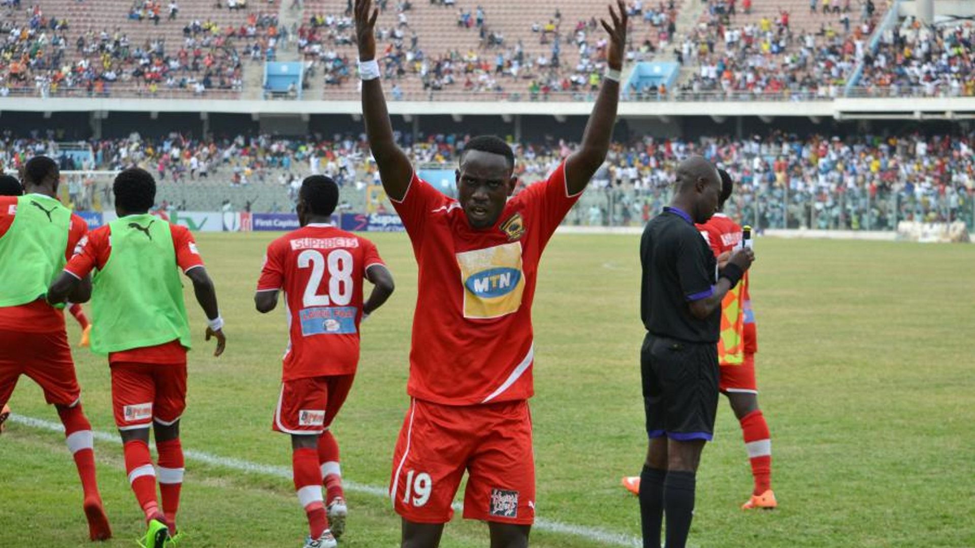 Asante Kotoko players celebrate vs. Hearts of Oak