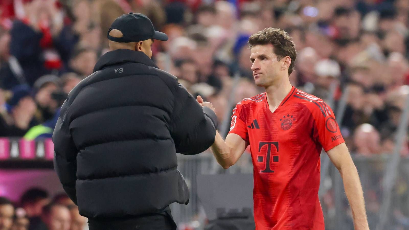 Thomas Müller + Vincent Kompany