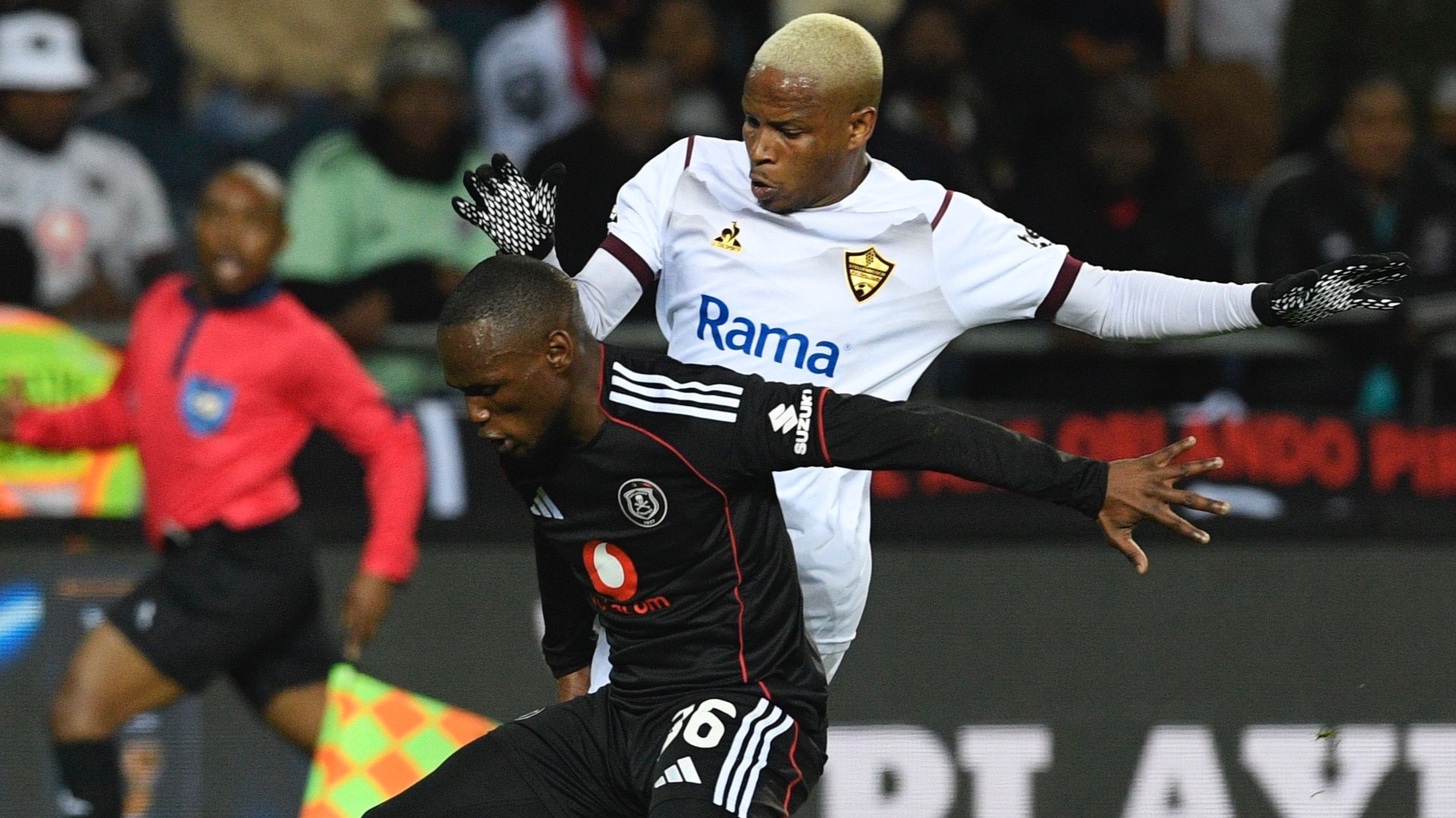 Kamogelo Sebelebele of Orlando Pirates and Lehlohonolo Mojela of Stellenbosch FC