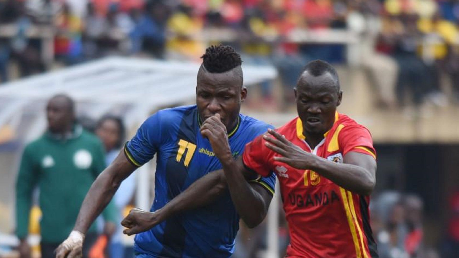 Thomas Ulimwengu of Tanzania challenges Godfrey Walusimbi of Uganda during the 2019 Afcon Qualifiers on 08 September 2018 at Mandela Stadium