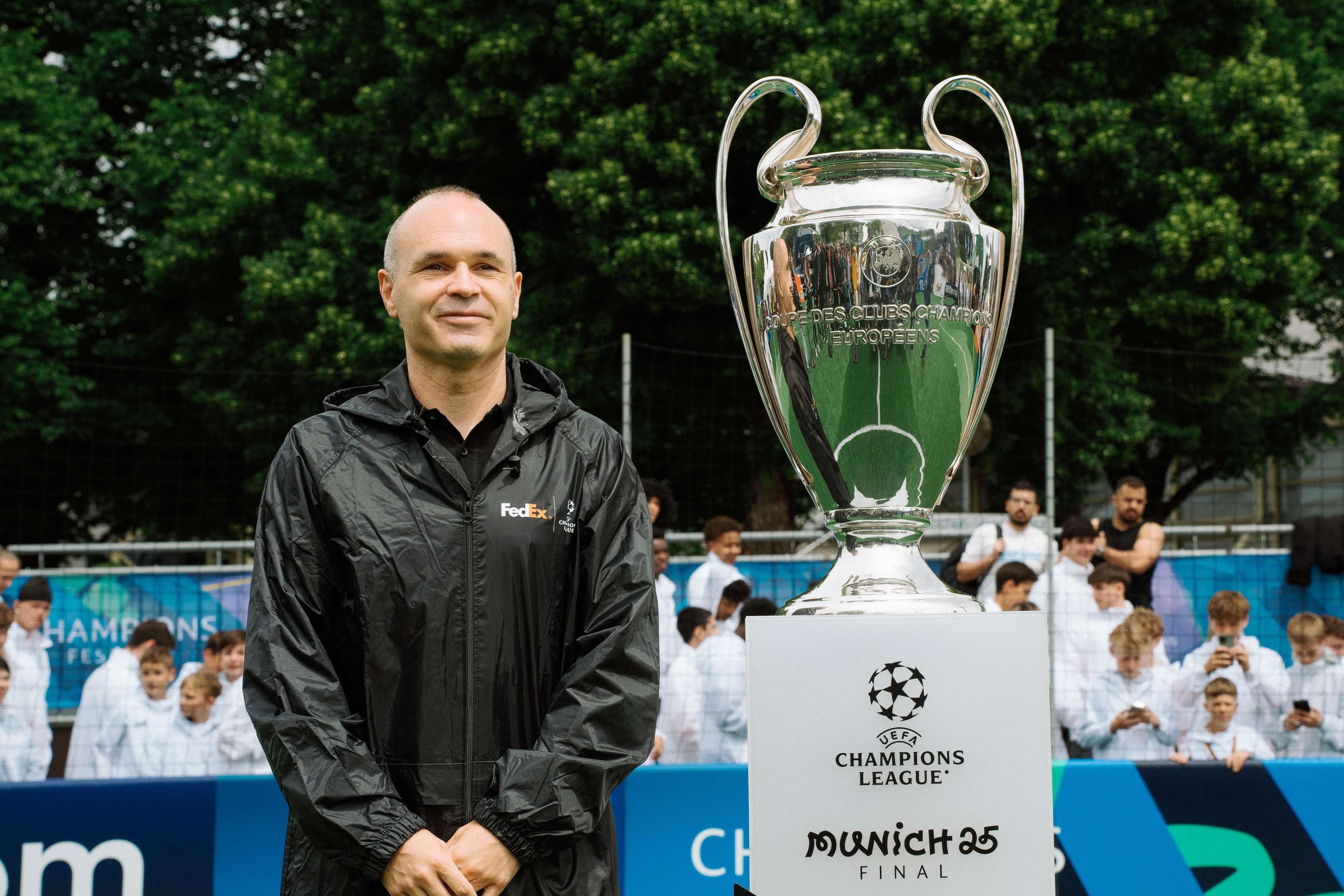 Andres Iniesta, FedEx, and UEFA Champions League trophy