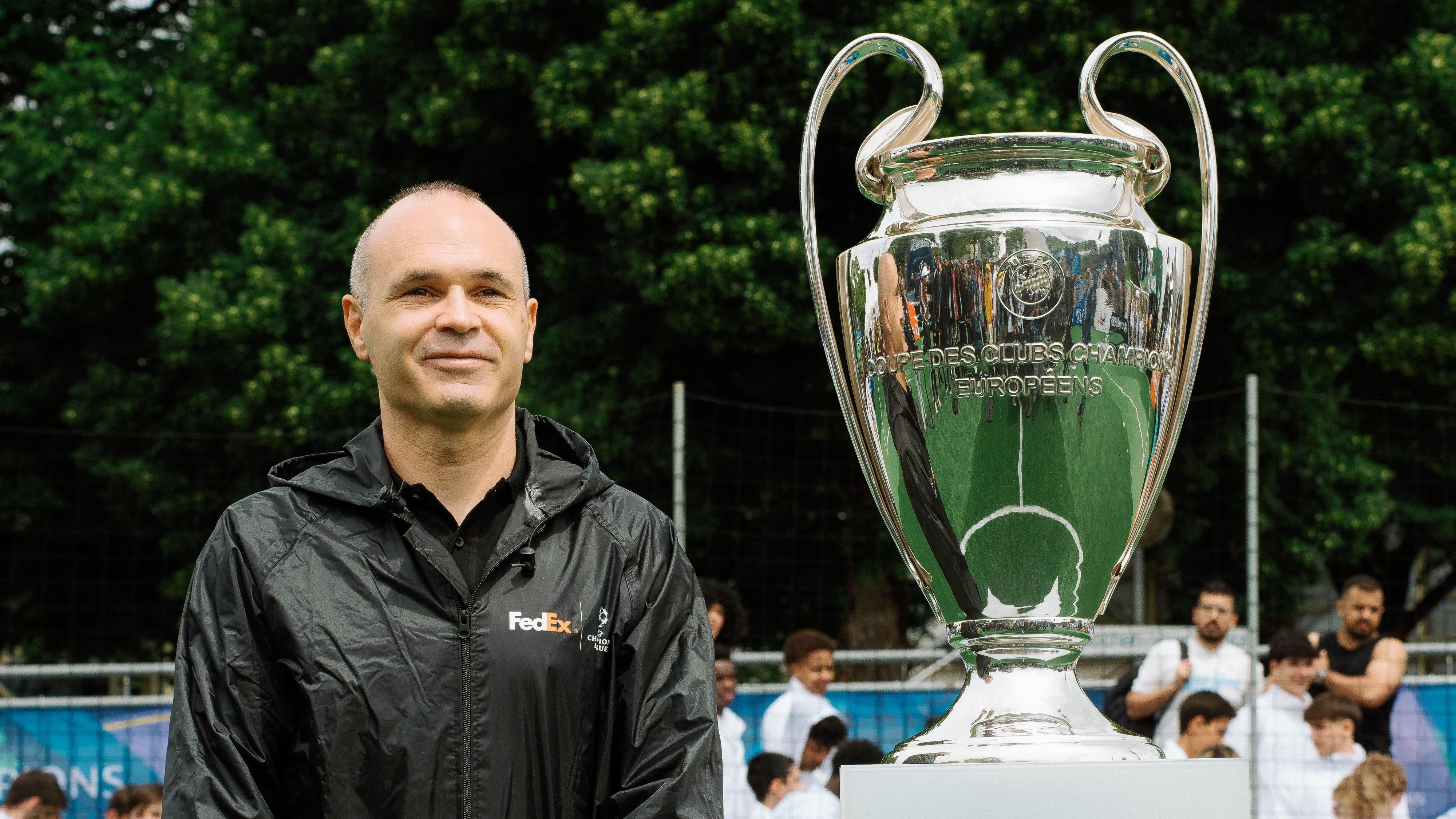 Barcelona legend Andres Iniesta teams up with FedEx to deliver UEFA Champions League trophy to Munich for Walk of Champions parade | Goal.com UK