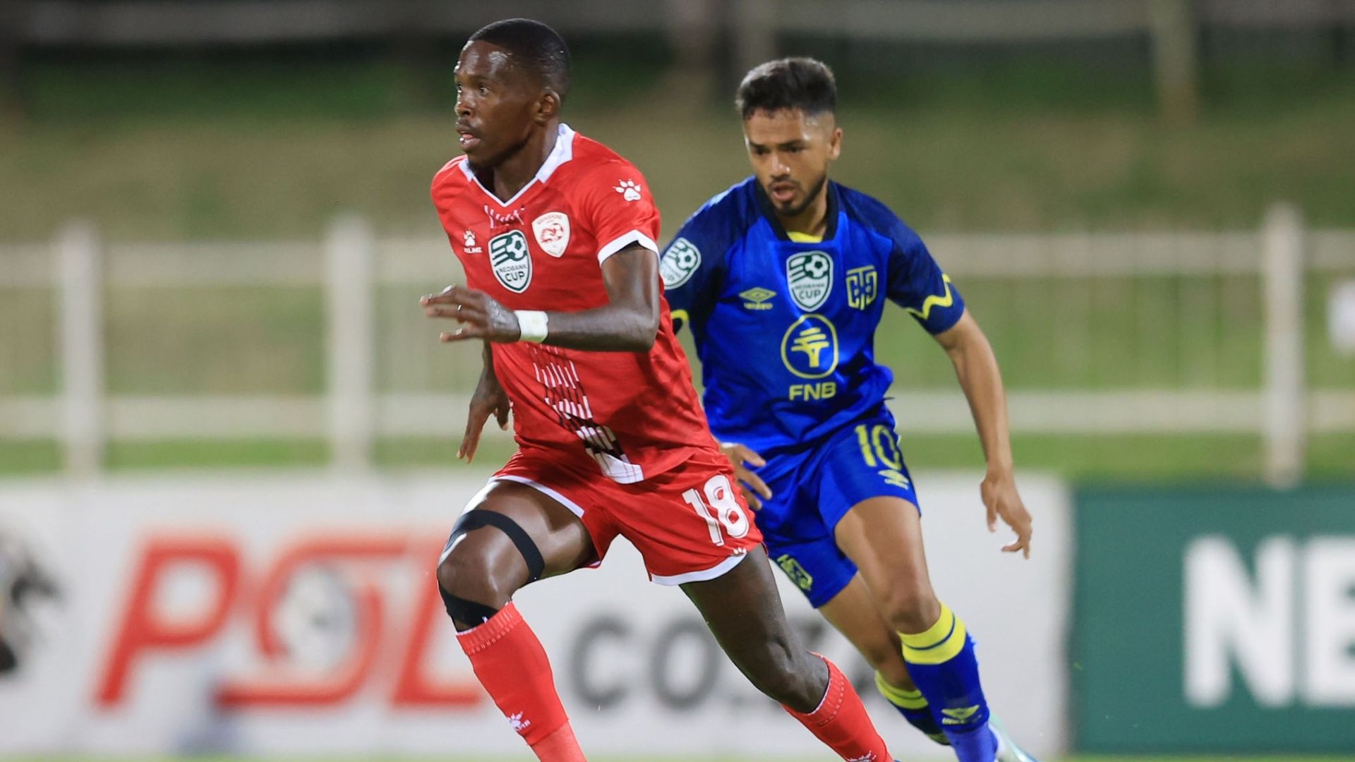 Thabang Monare, Sekhukhune United & Haashim Domingo, Cape Town City, January 2025.