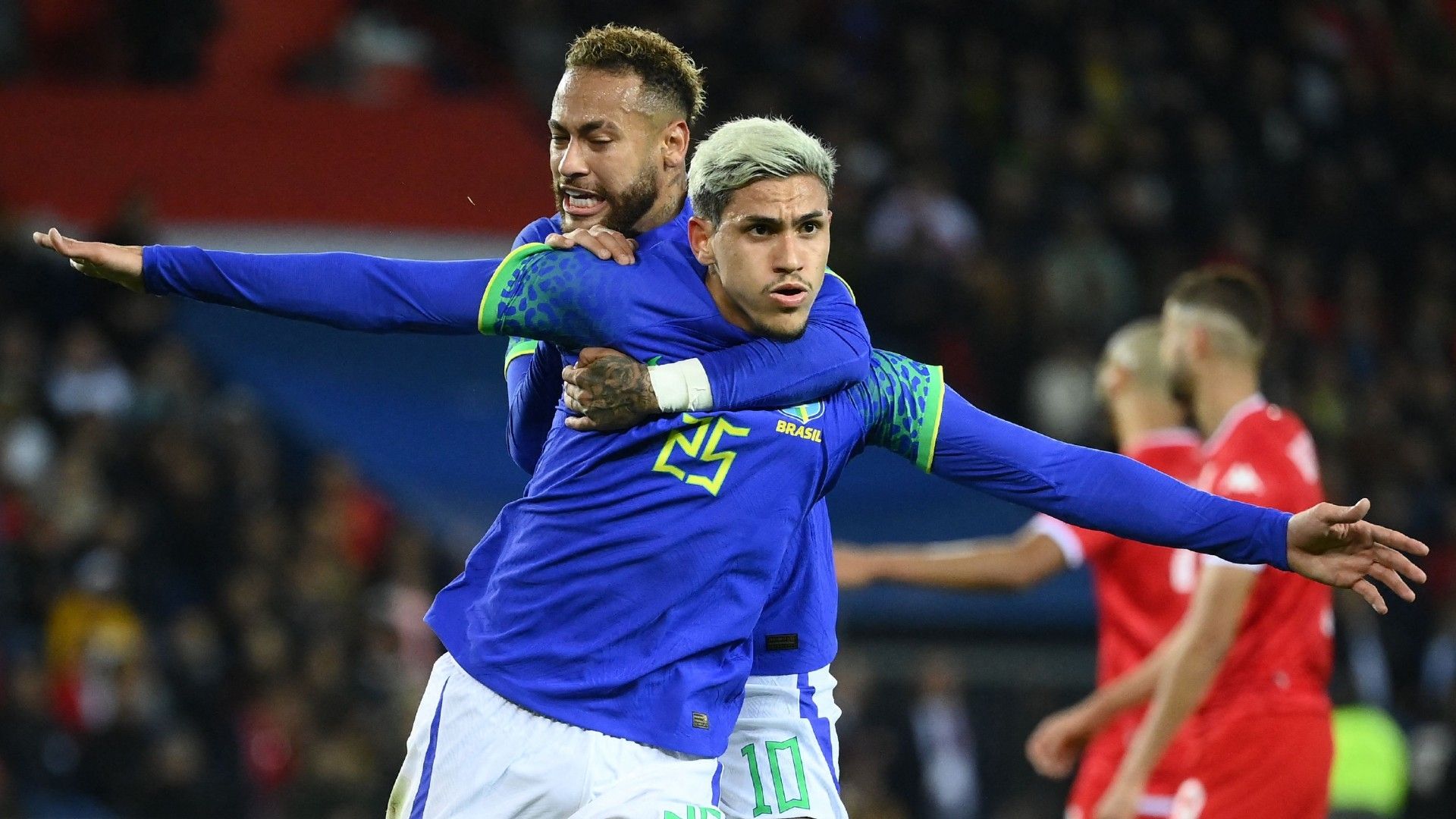 Brazil's forward Pedro (R) celebrates scoring his team's fifth goal with Brazil's forward Neymar