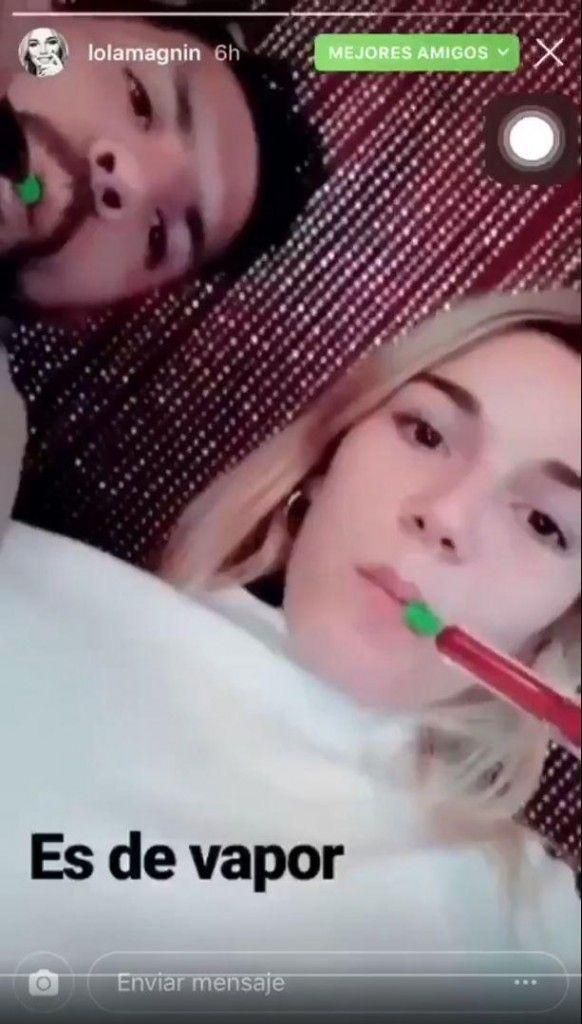 Aguero smokes hookah with a model