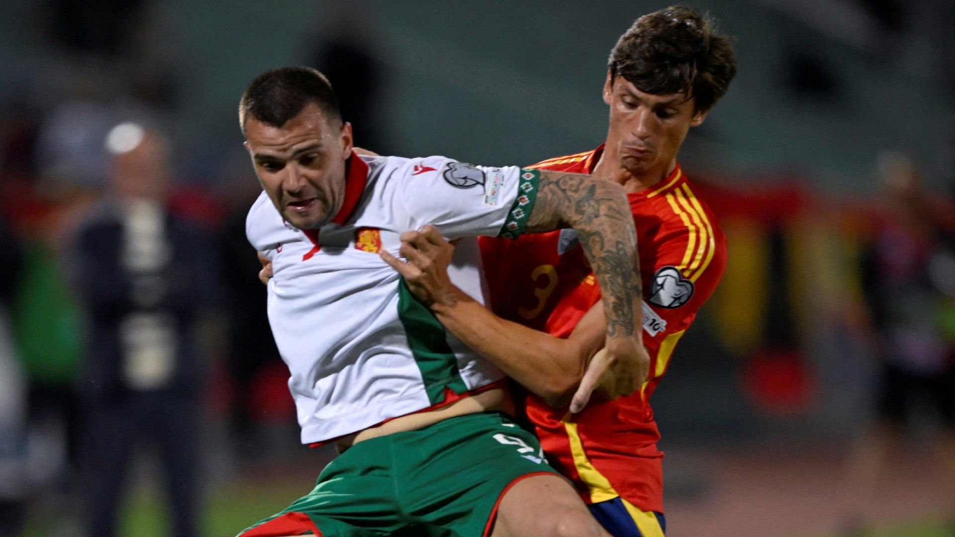 Bulgaria's forward #09 Aleksandar Kolev and Spain's defender #03 Robert Le Normand