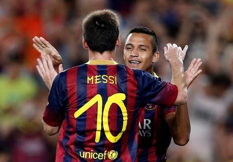 Alexis Sanchez and Lionel Messi celebrate for Barcelona in their friendly against Santos