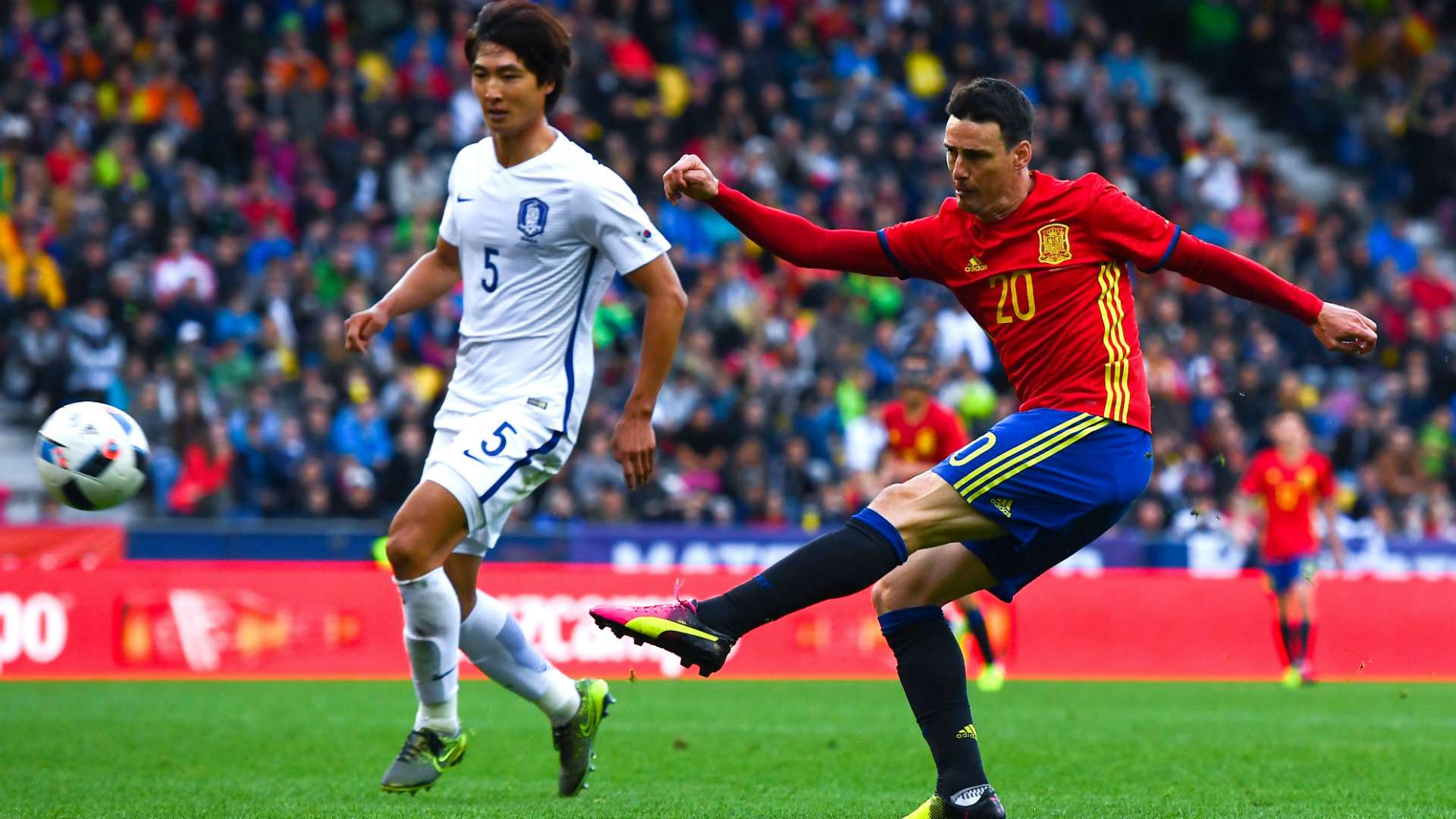Aritz Aduriz of Spain shoots towards goal against Korea