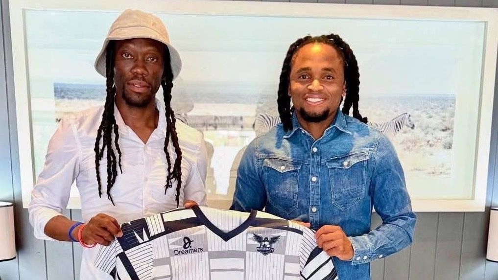 Reneilwe Letsholonyane of Matebele FC alongside Siphiwe Tshabalala