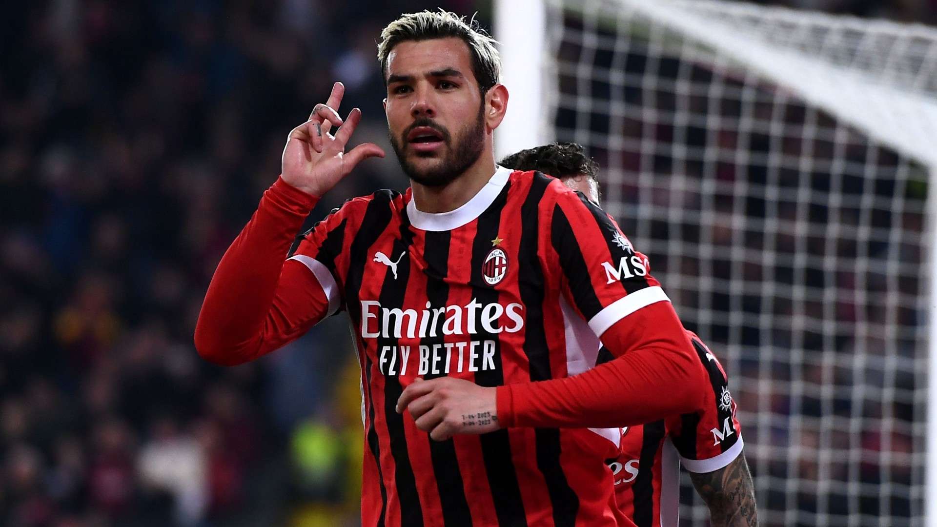 Theo Hernández of AC Milan celebrates after scoring