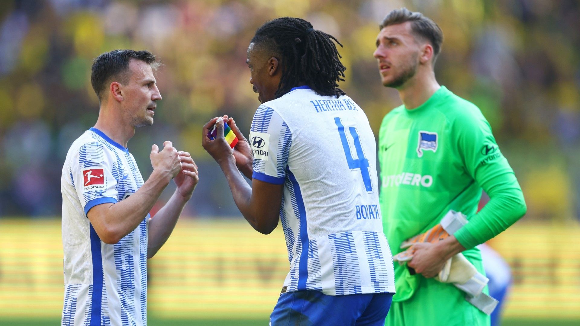 Peter Pekarik of Hertha BSC reacts towards teammate Dedryck Boyata