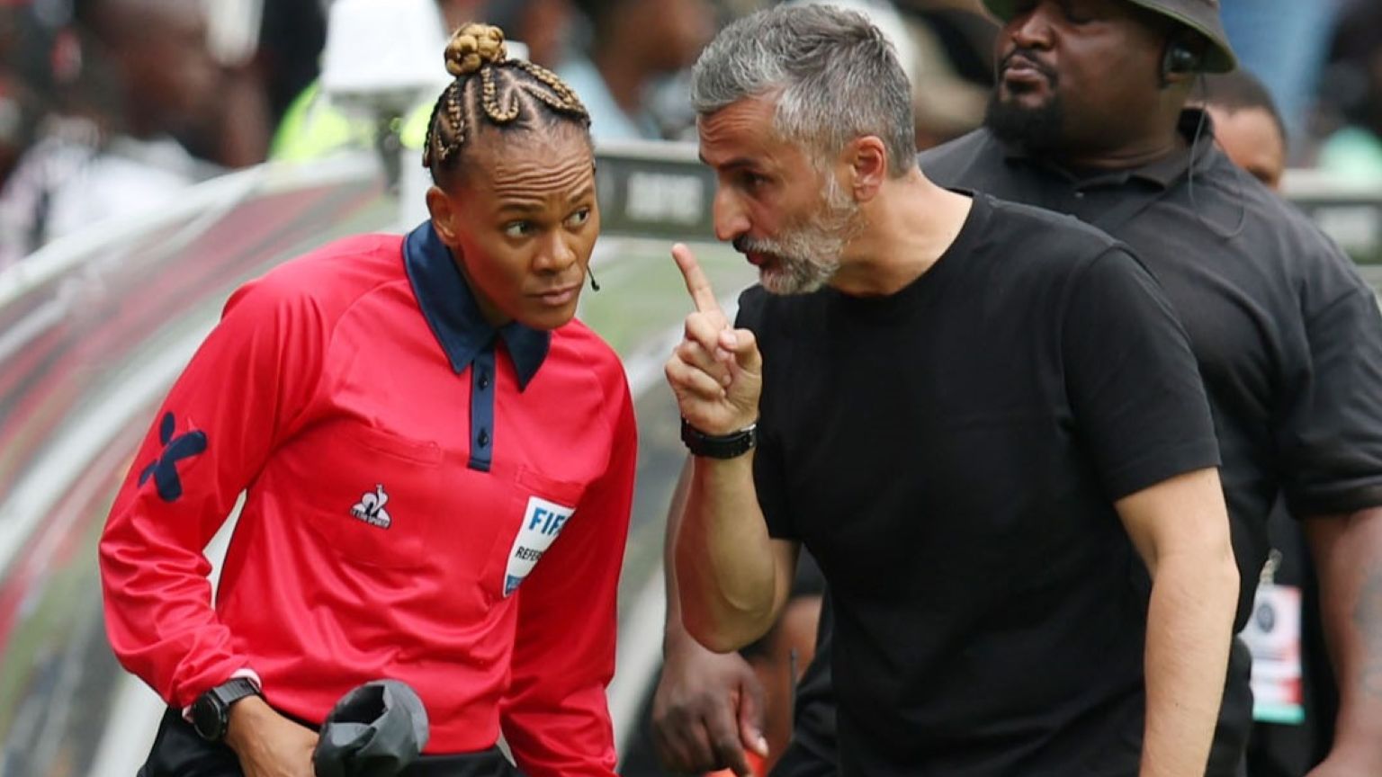Jose Riveiro of Orlando Pirates and referee Akhona Makalima