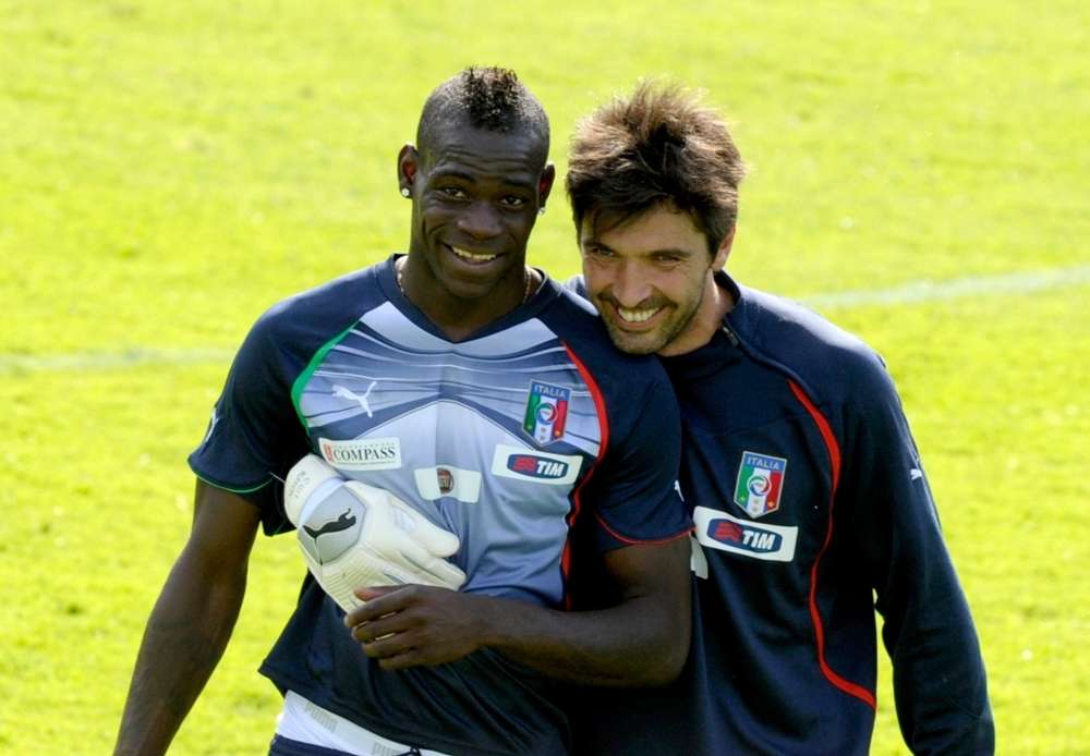 Mario Balotelli and Gianluigi Buffon of Italy