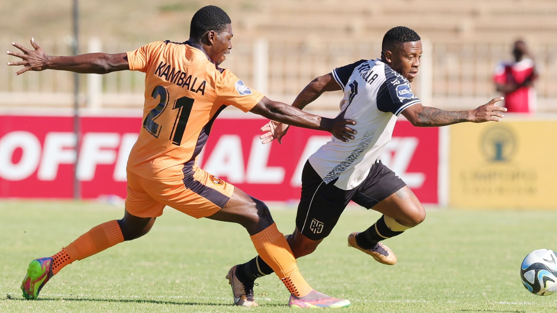 Thabiso Kutumela of Cape Town City & Manuel Kambala of Polokwane City. April 2024