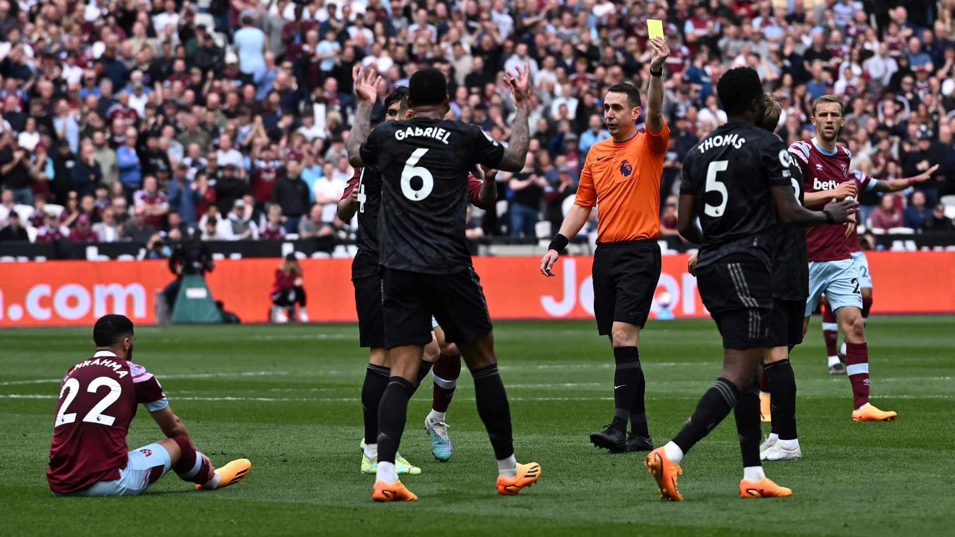 Gabriel is yellow carded after conceding a penalty against West Ham