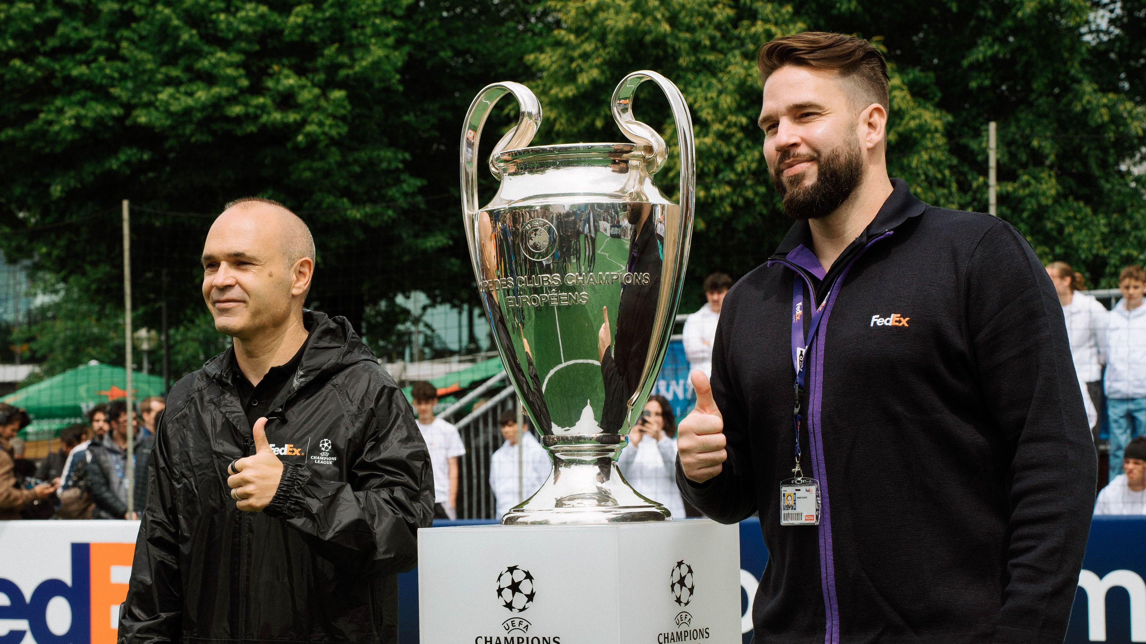 Andres Iniesta, a FedEx courier, and the UEFA Champions League trophy