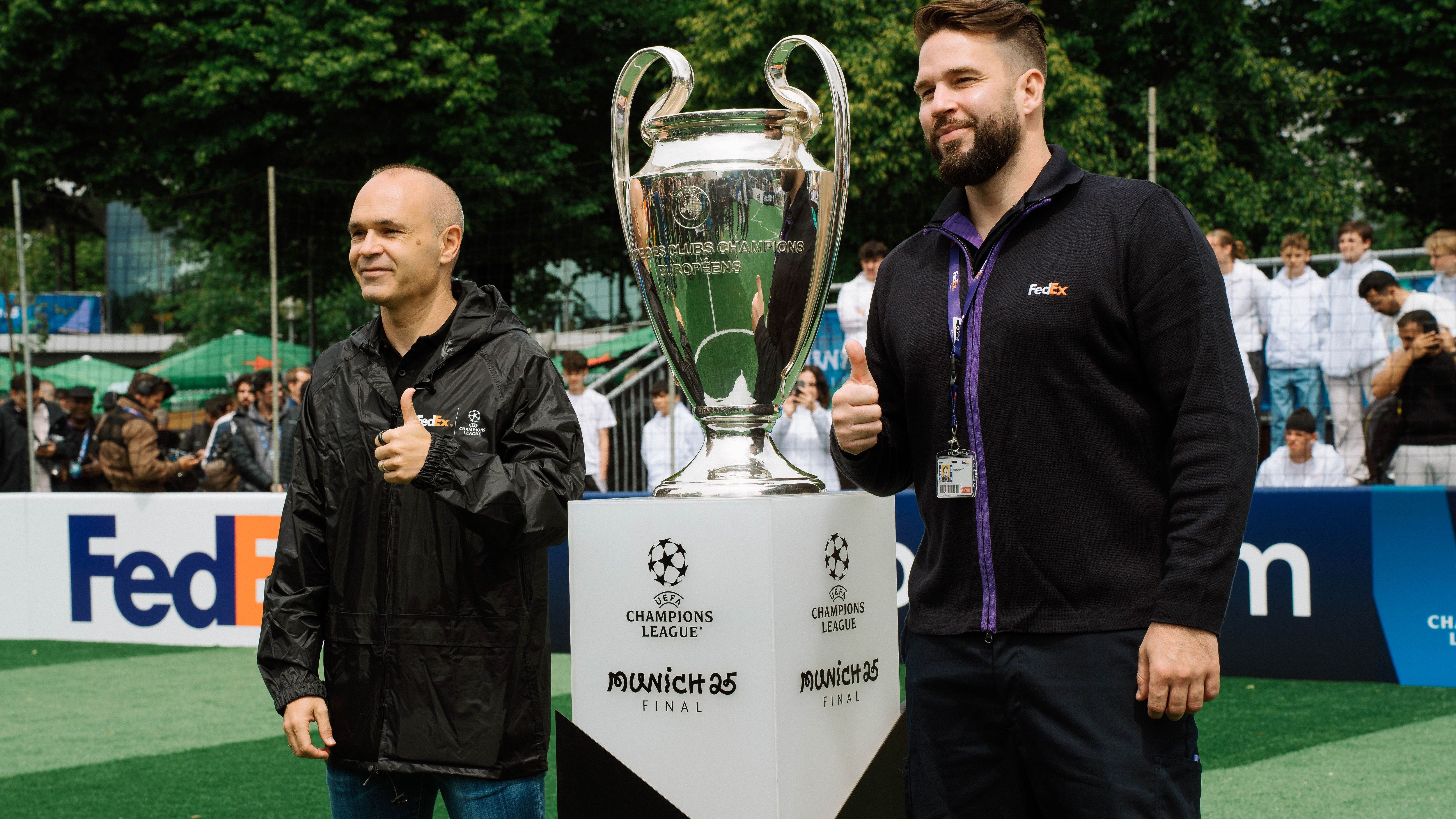Andres Iniesta, a FedEx courier, and the UEFA Champions League trophy