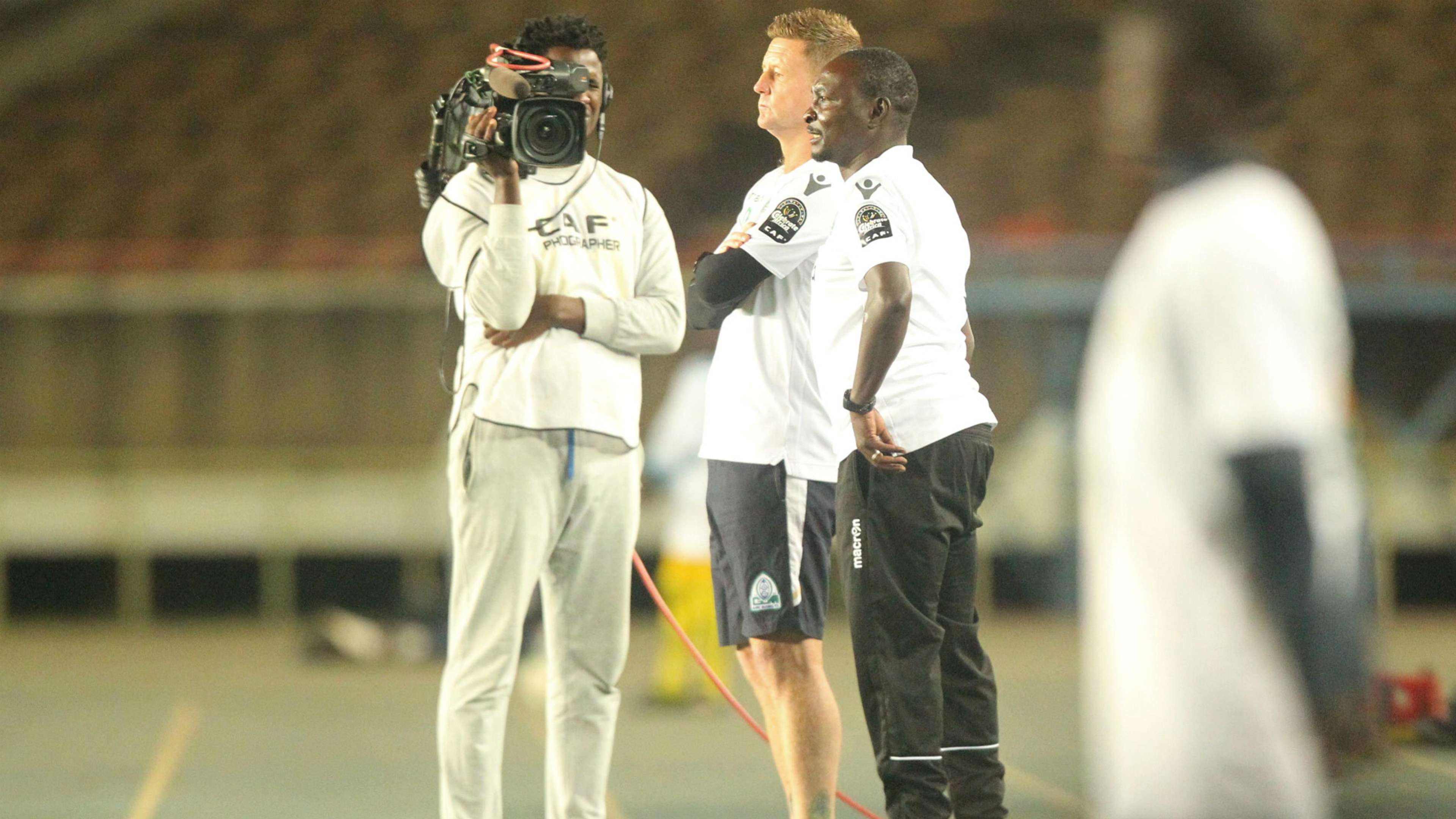 Gor Mahia coach Dylan Kerr and Zedekiah Otieno.j