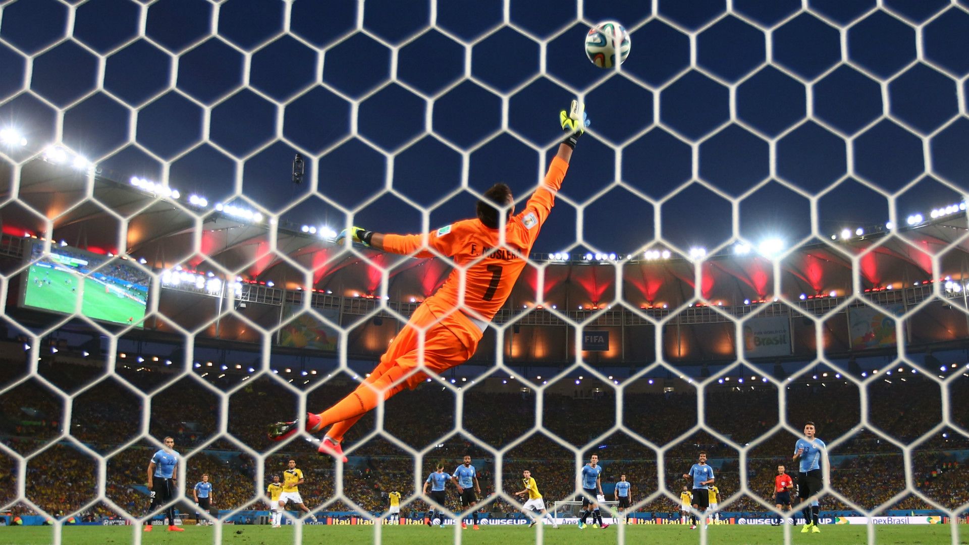 Fernando Muslera James Rodriguez Colombia Uruguay FIFA World Cup Brazil 2014