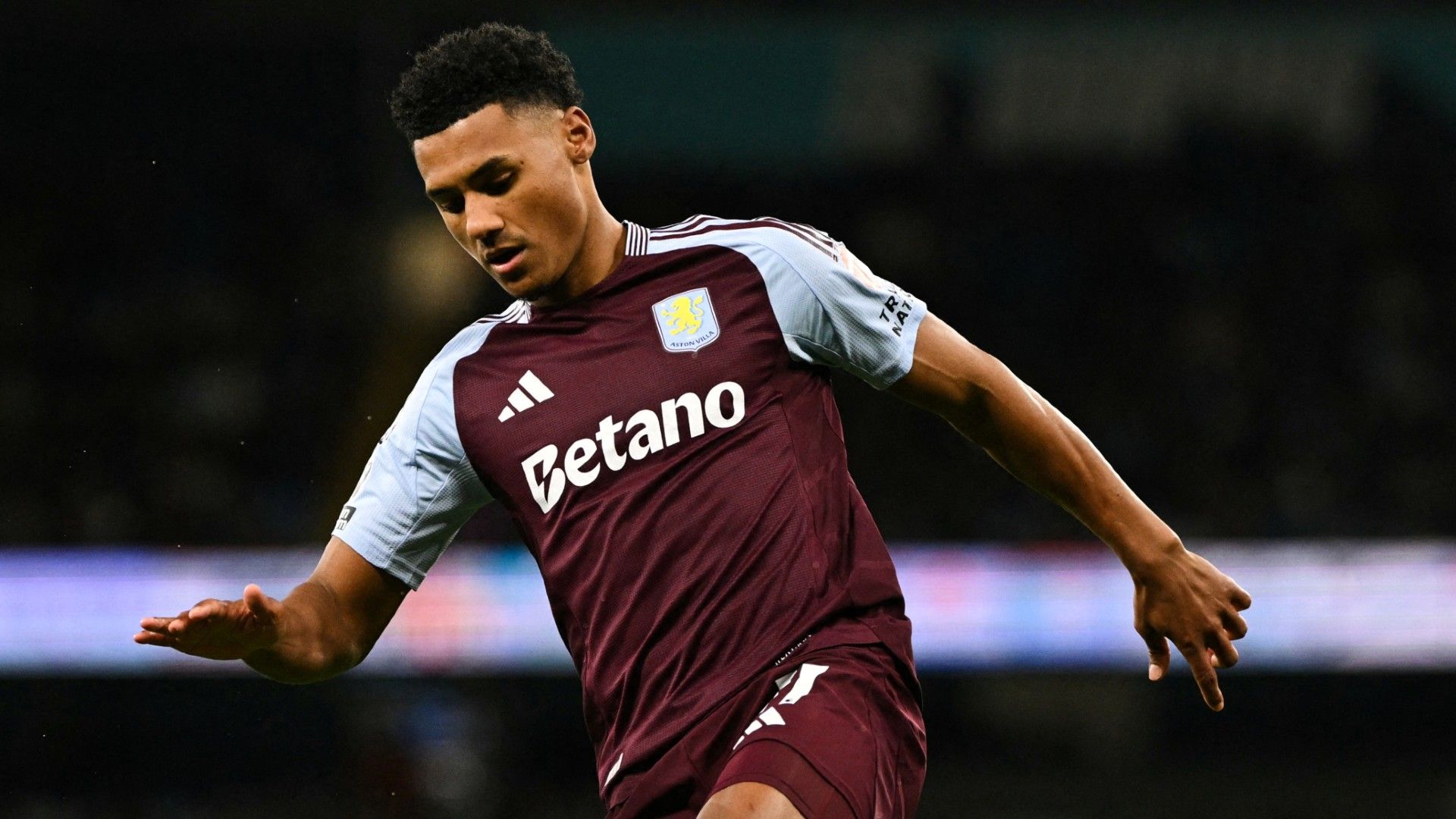Aston Villa's English striker #11 Ollie Watkins controls the ball 