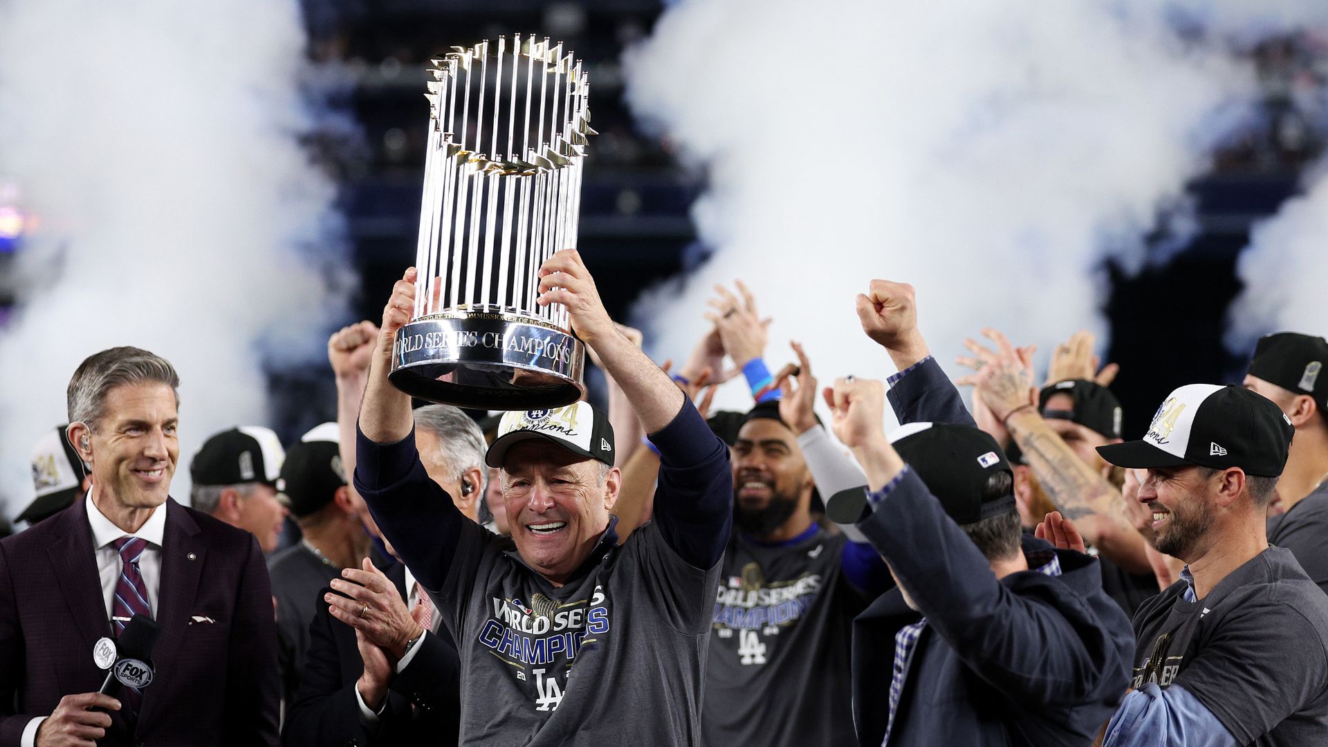 Los Angeles Dodgers celebrates with the Commissioner's Trophy 2024