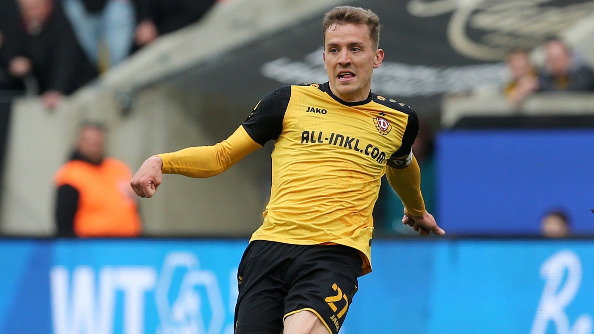 Niklas Hauptmann of Dresden runs with the ball