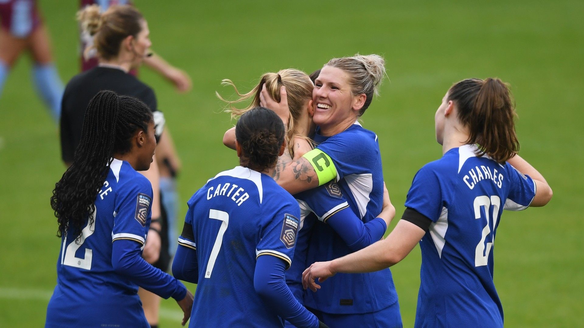 Millie Bright Chelsea hugs team-mates 2023-24