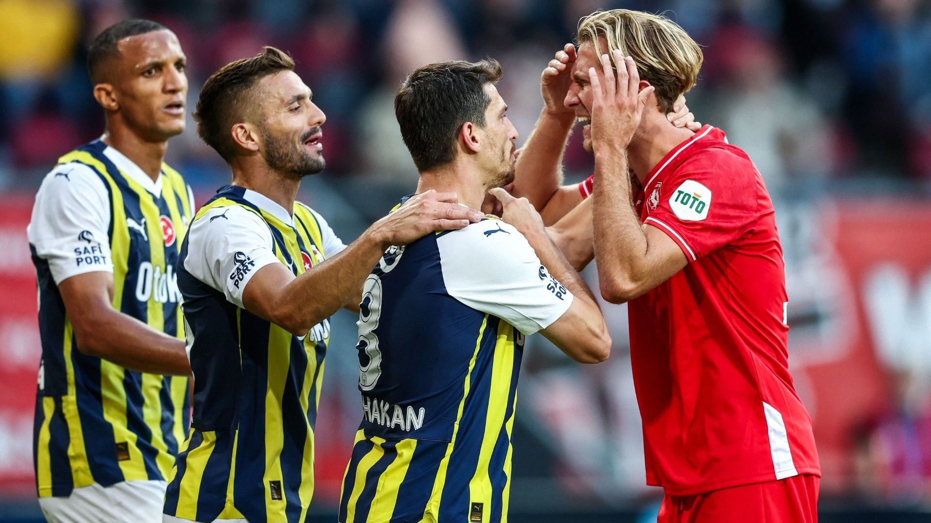 Fenerbahce's Serbian forward Dusan Tadic (2-L), Fenerbahce's Turkish midfielder Mert Hakan Yandas (2-R)