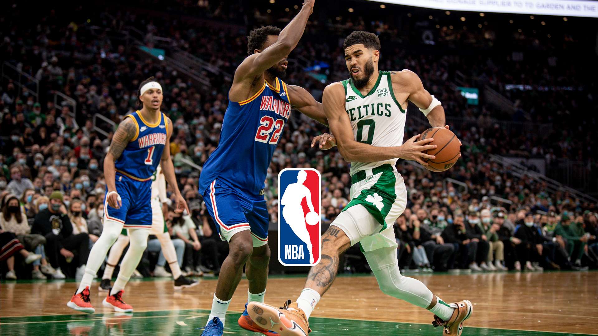 Jayson Tatum drives to the basket Andrew Wiggin defends Jordan Poole watches Boston Celtics Golden State Warriors NBA 2021/2022 Finals