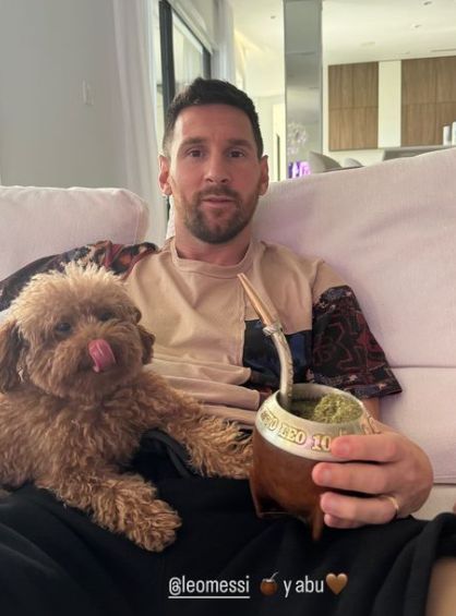 Lionel Messi and his family dog
