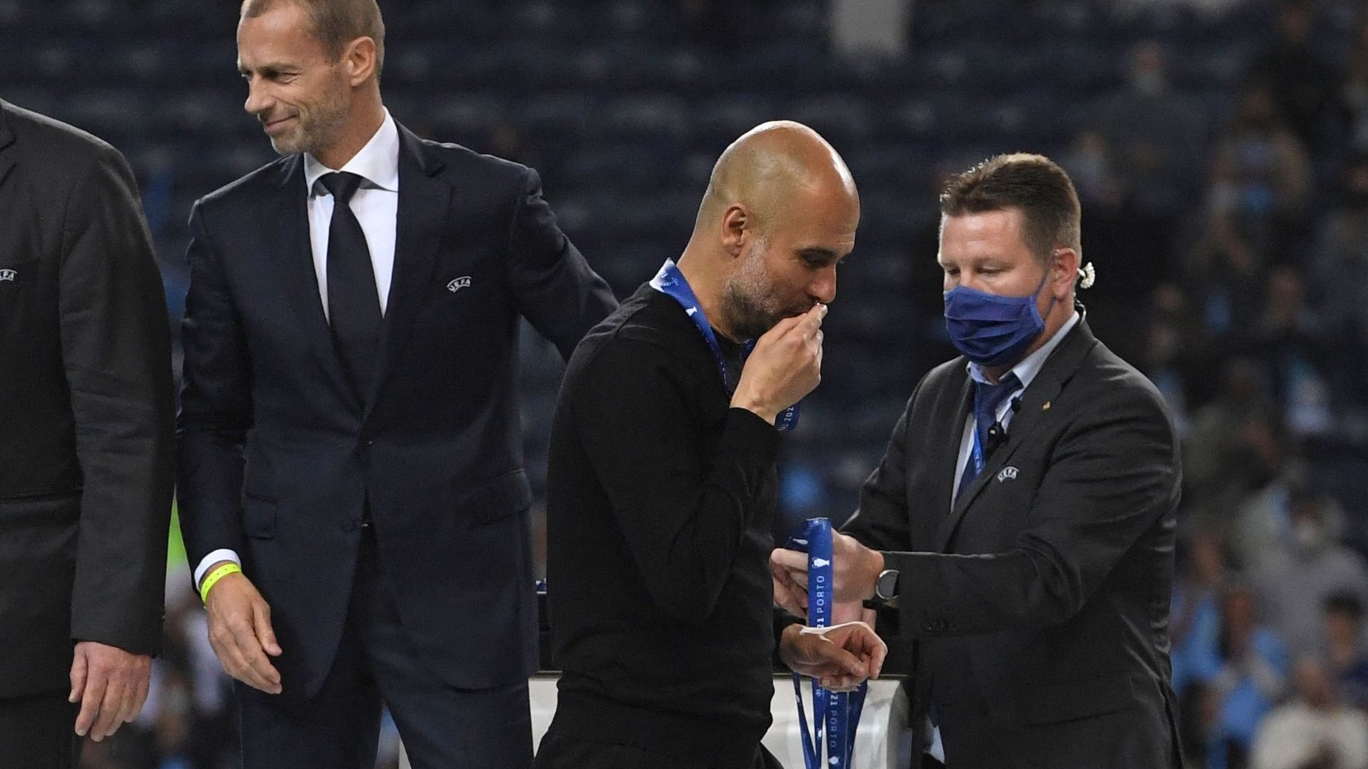 Pep Guardiola medal kiss