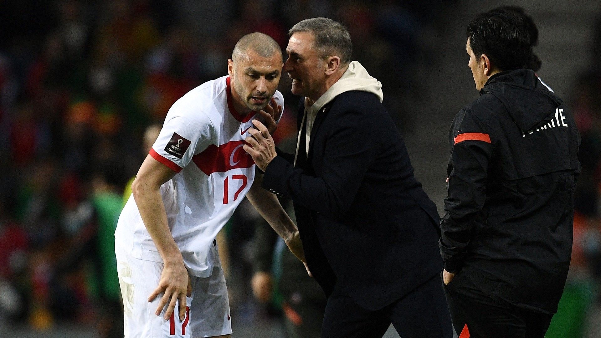 Turkey Head Coach Stefan Kuntz gives instructions to Burak Yilmaz