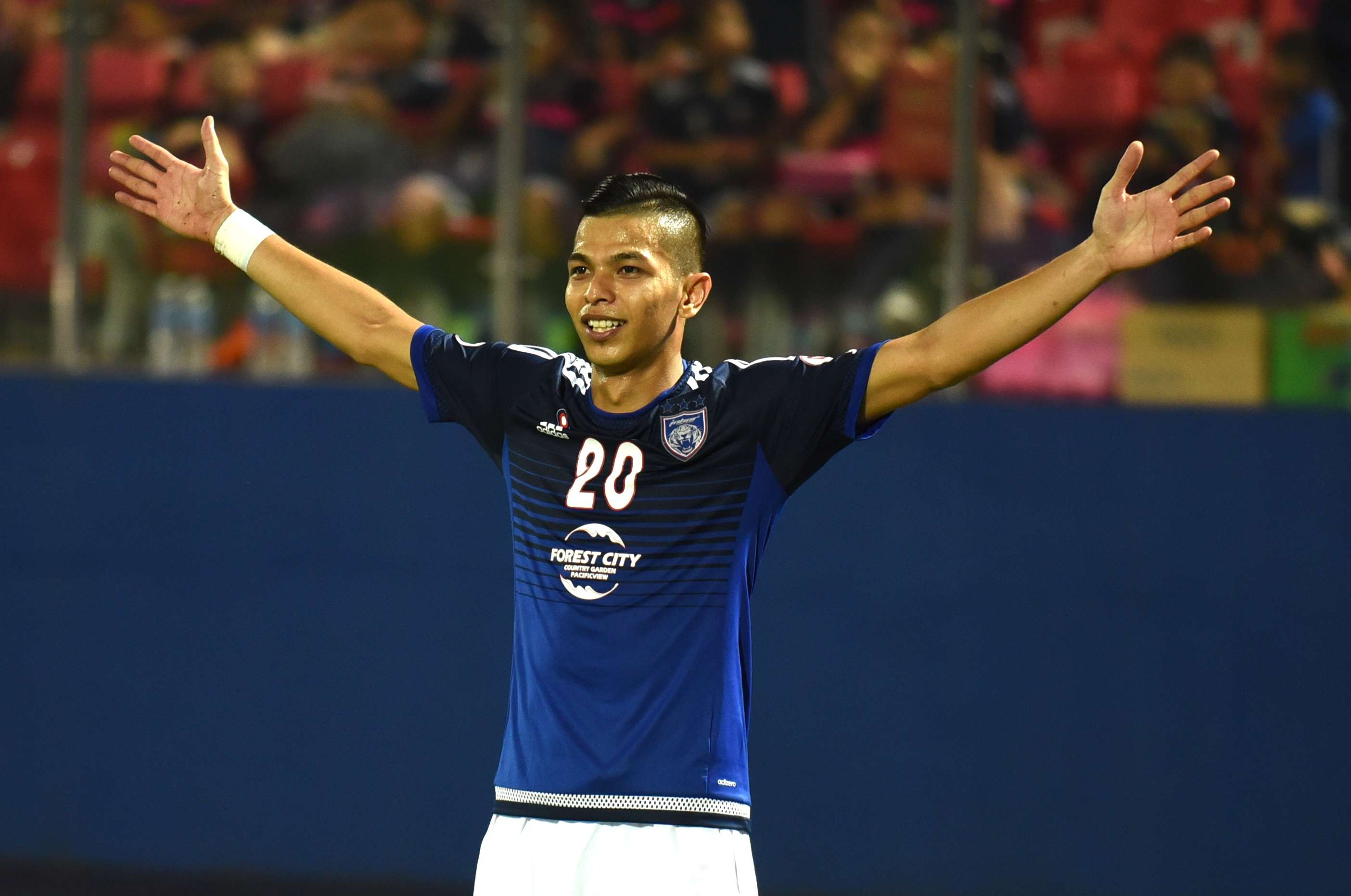 Johor Darul Ta'zim's Nazrin Nawi celebrating his goal against PDRM 13/8/2016