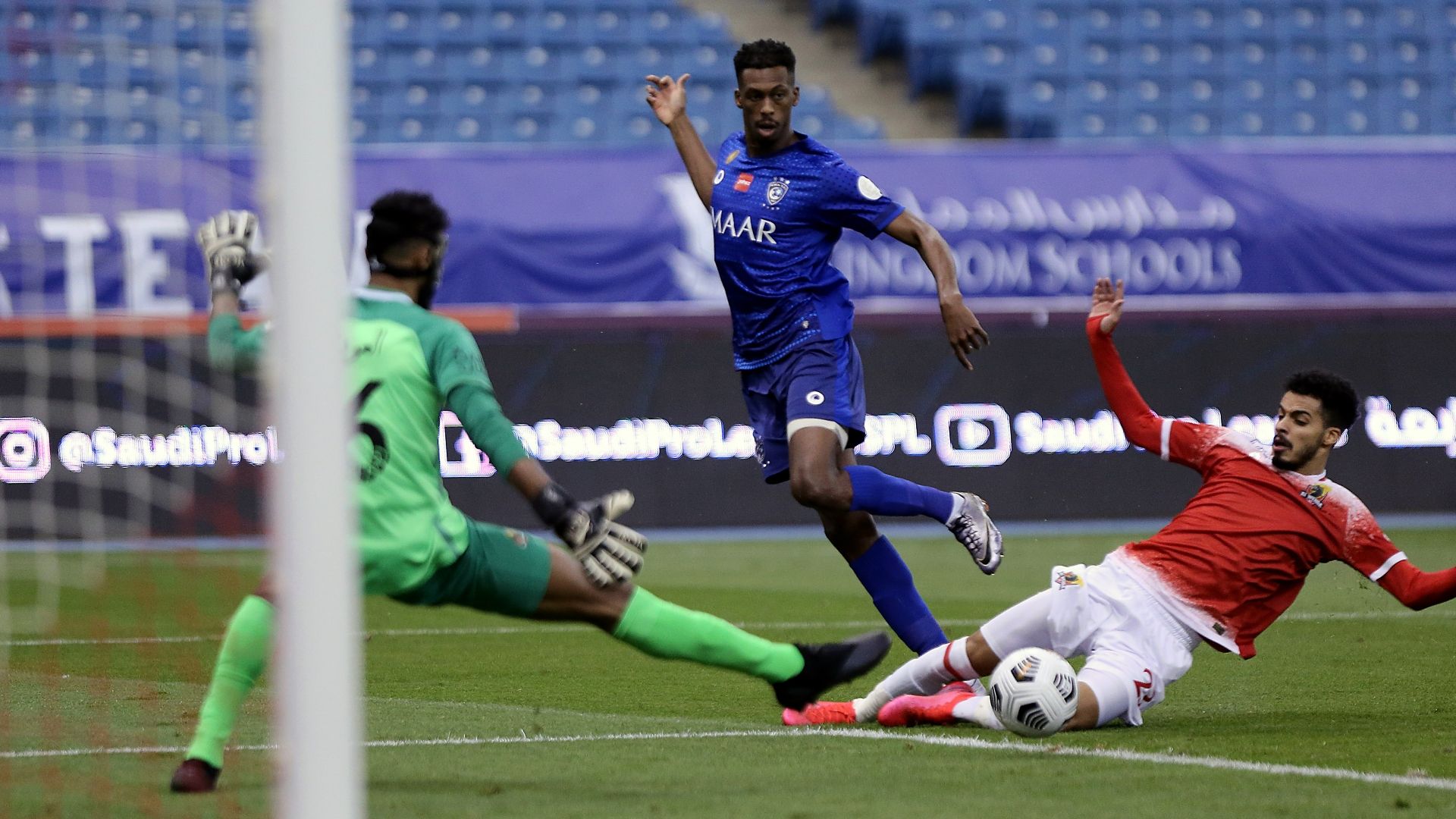 Mohamed Kanno (C) Noor Al Rashidi (R) Abdullah Al Owisher (L) Al Hilal Al Wehda SPL 13 December 2020