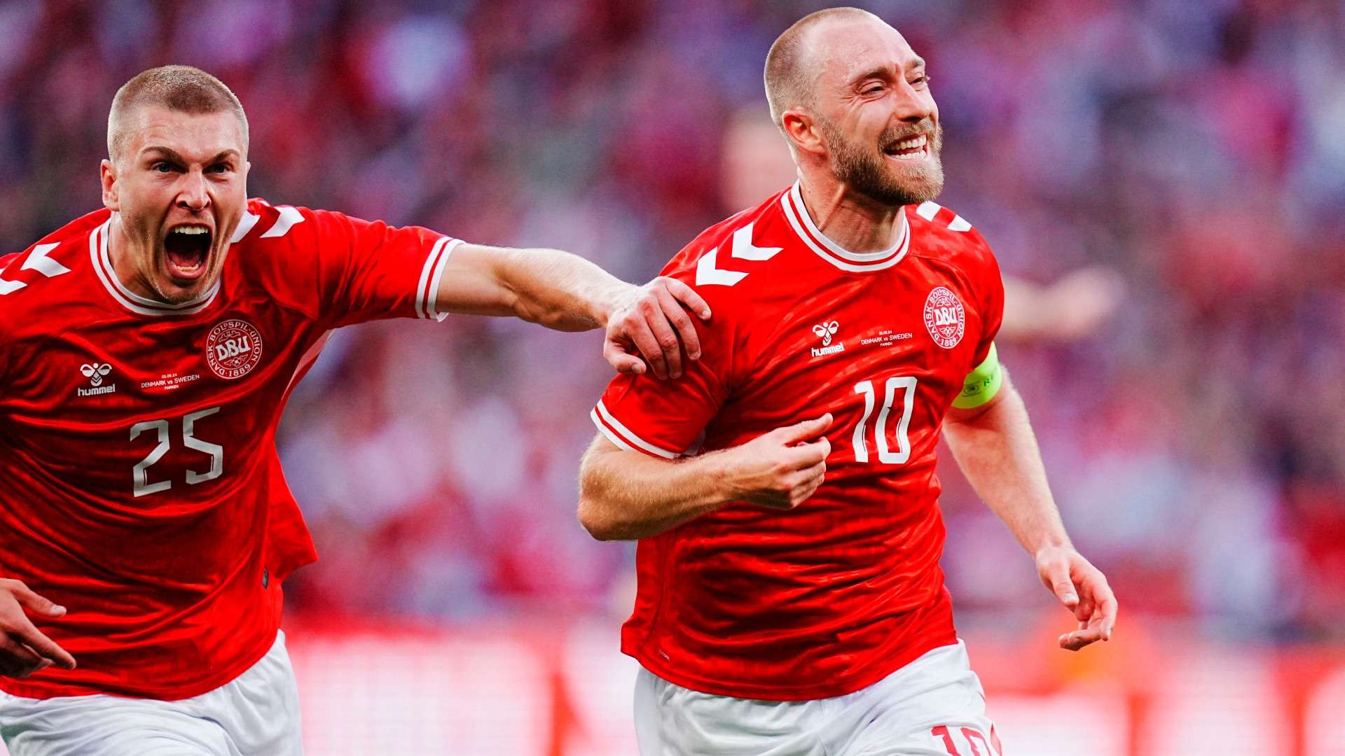 Denmark's midfielder Christian Eriksen celebrates