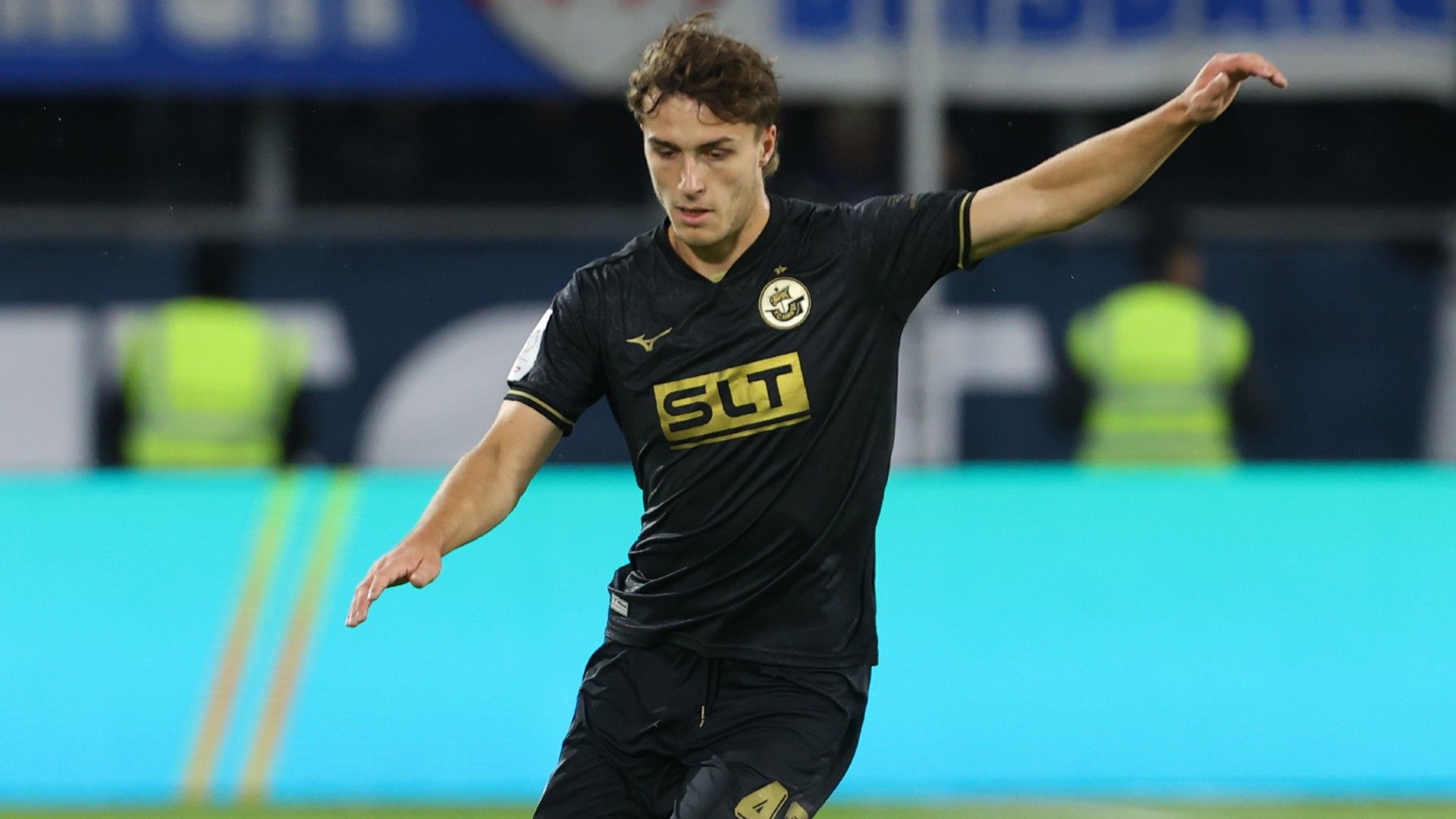 Benno Dietze of Rostock controls the ball