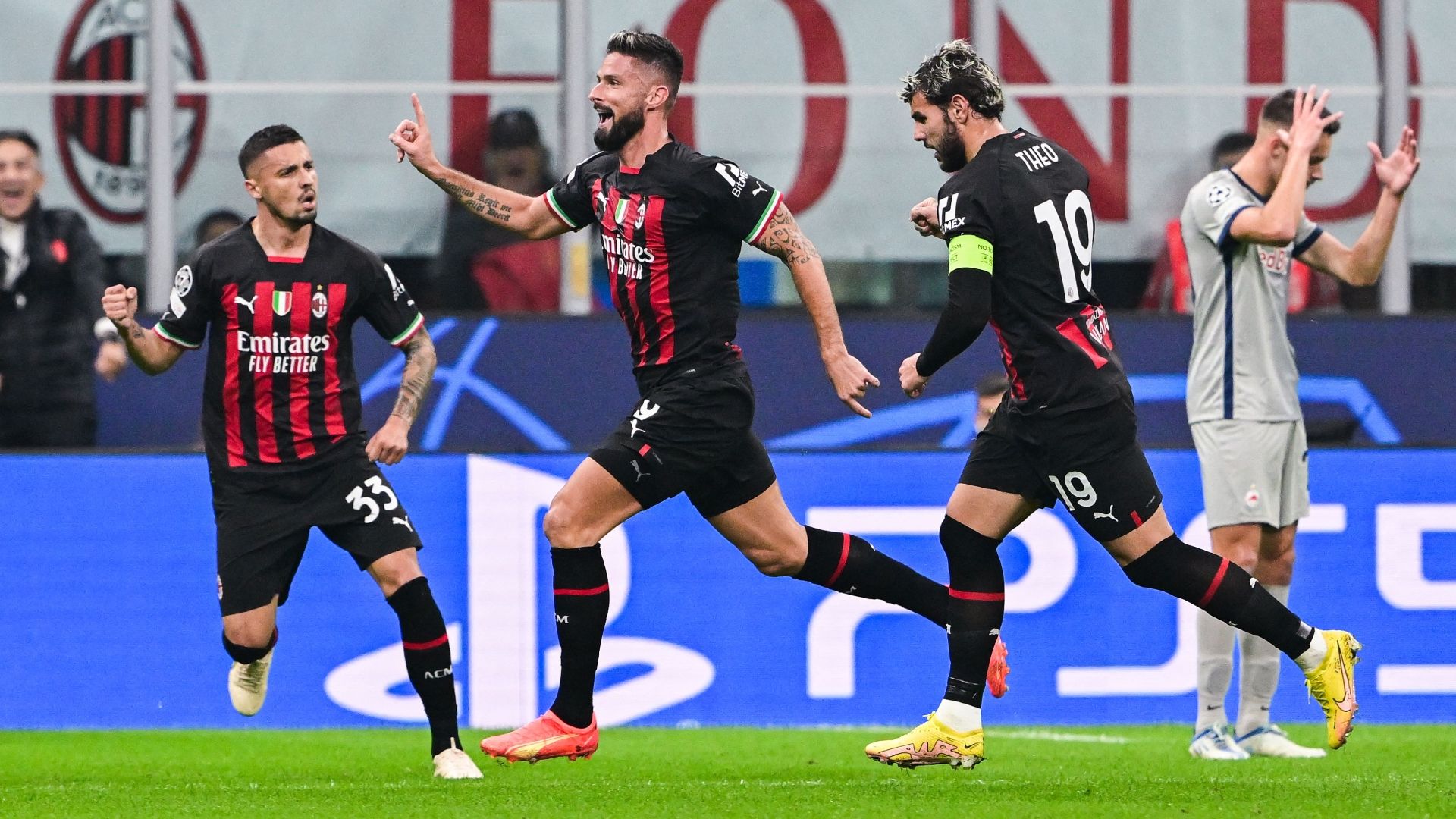 Giroud celebrating Milan Salzburg Champions League