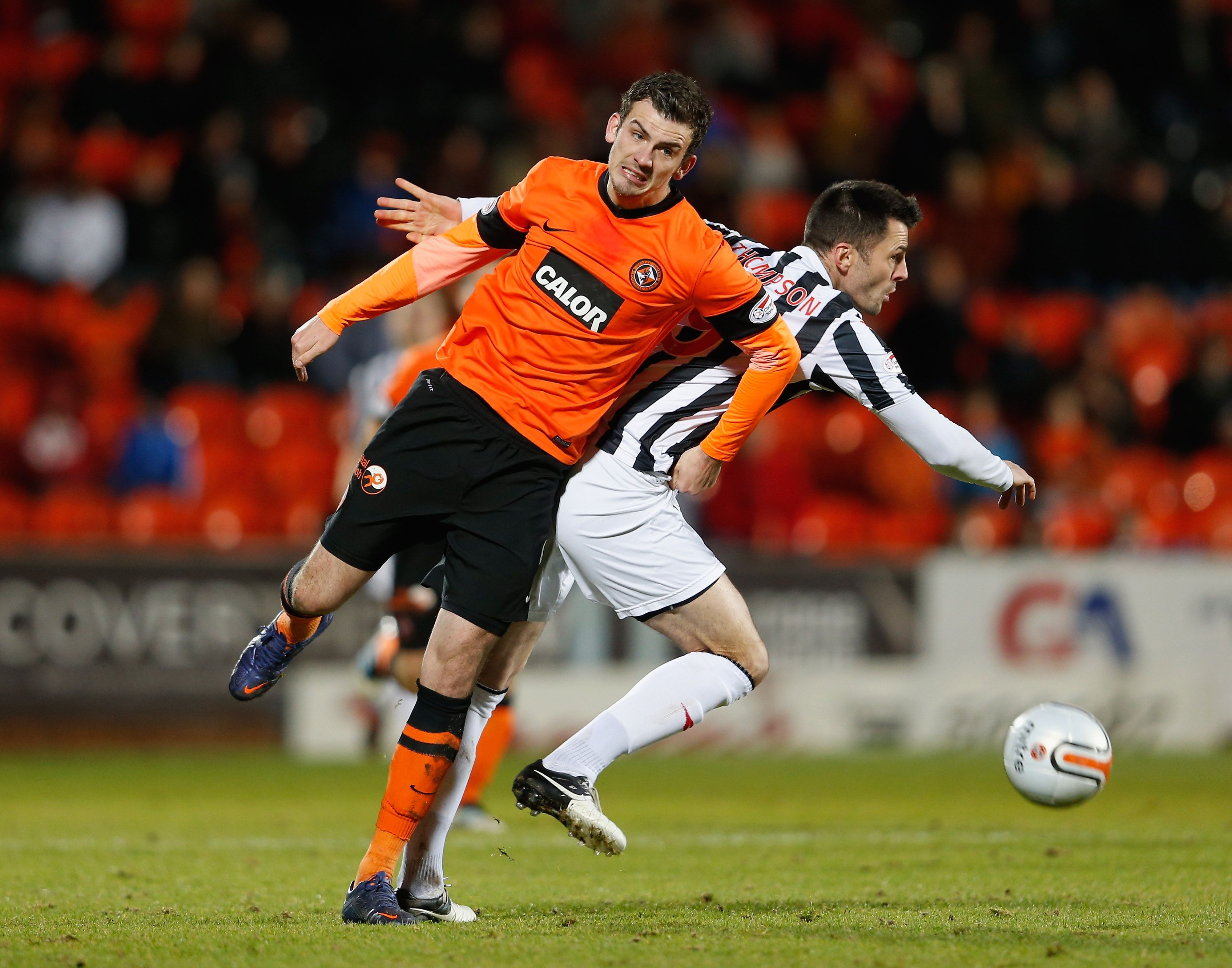 Dundee United's Gavin Gunning (L)