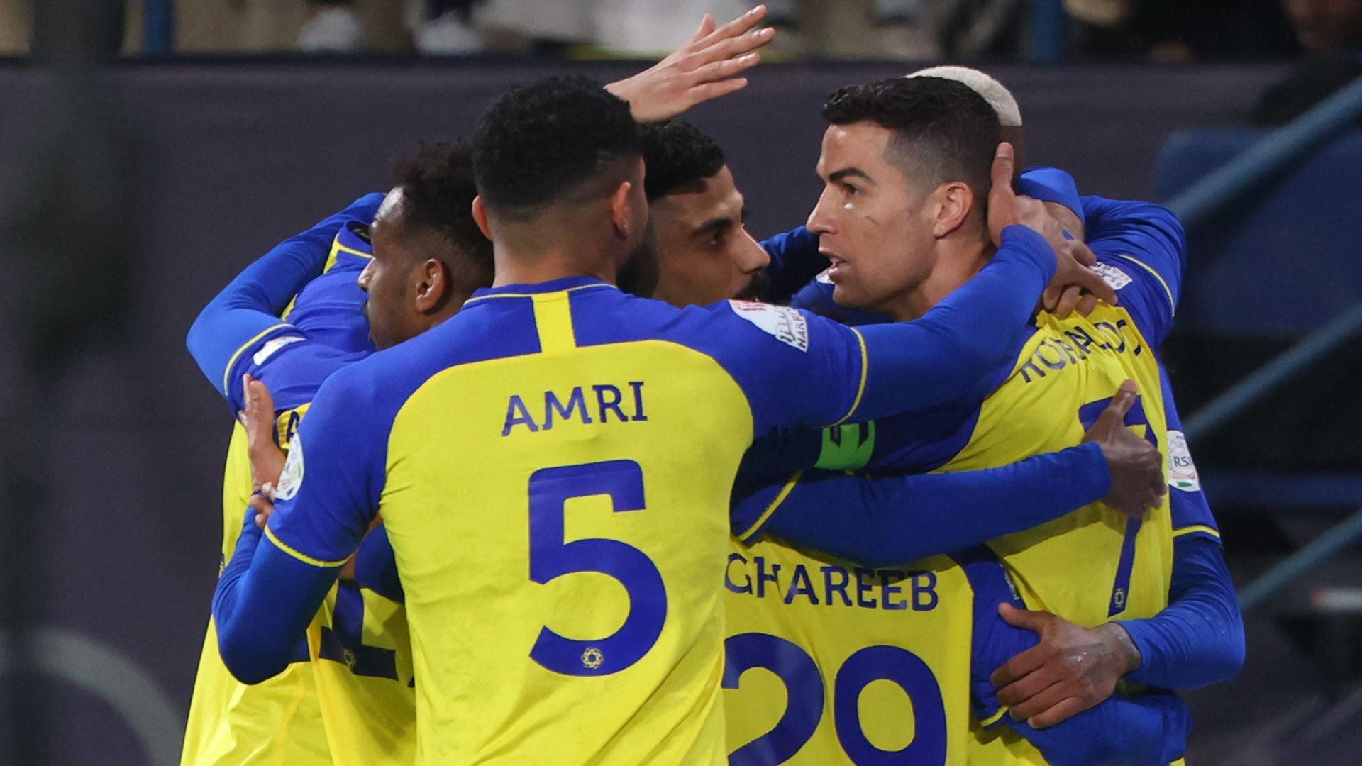Nassr celebrating