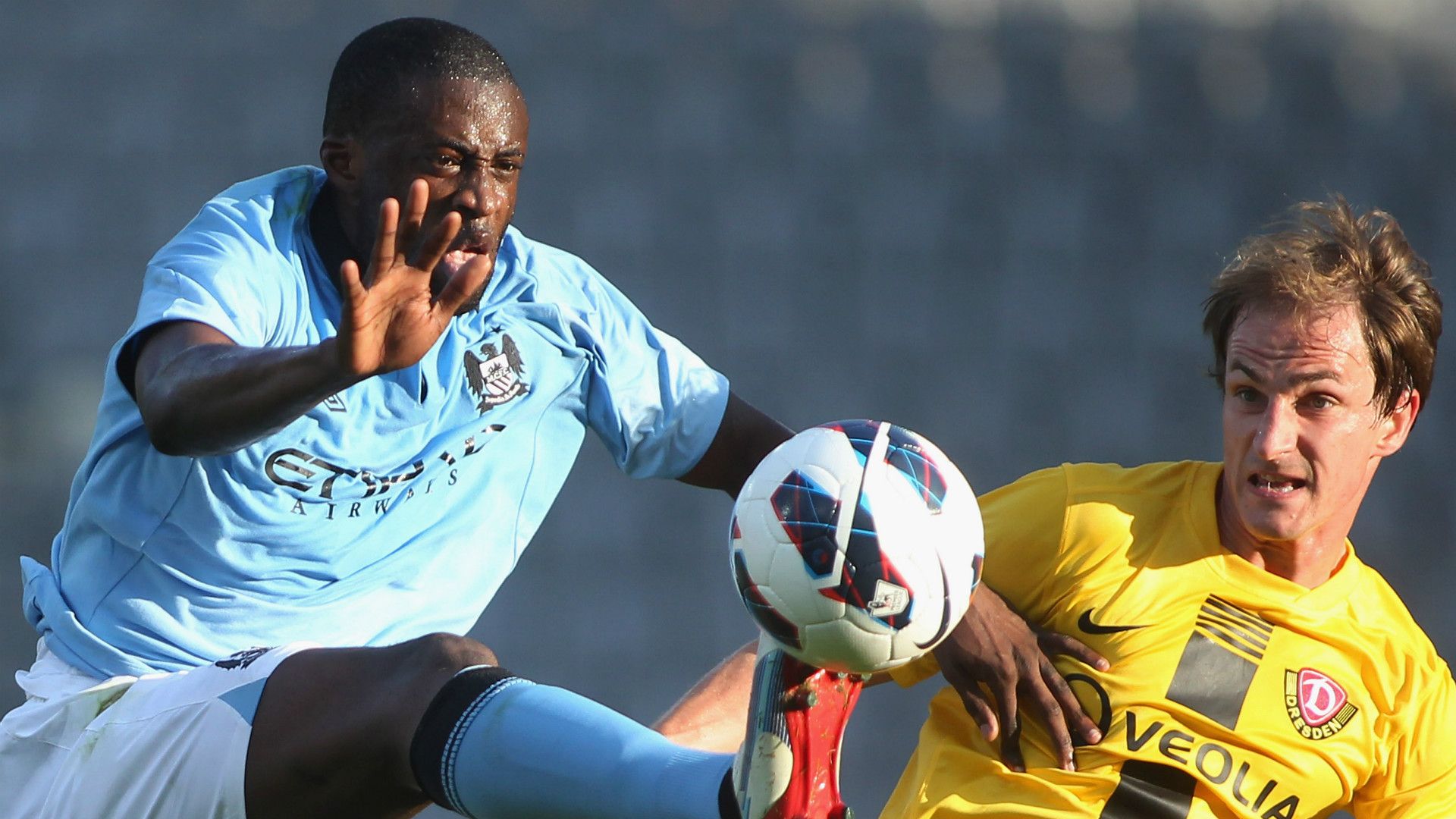 YAYA TOURE MANCHESTER CITY DAVID SOLGA DYNAMO DRESDEN FRIENDLY 17012012