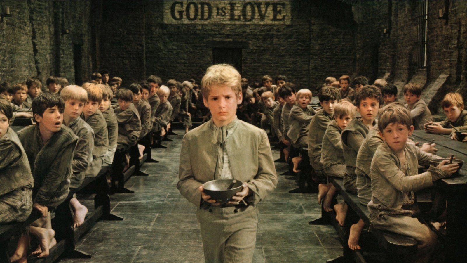 The iconic scene from Oliver (1968) asking for more food.