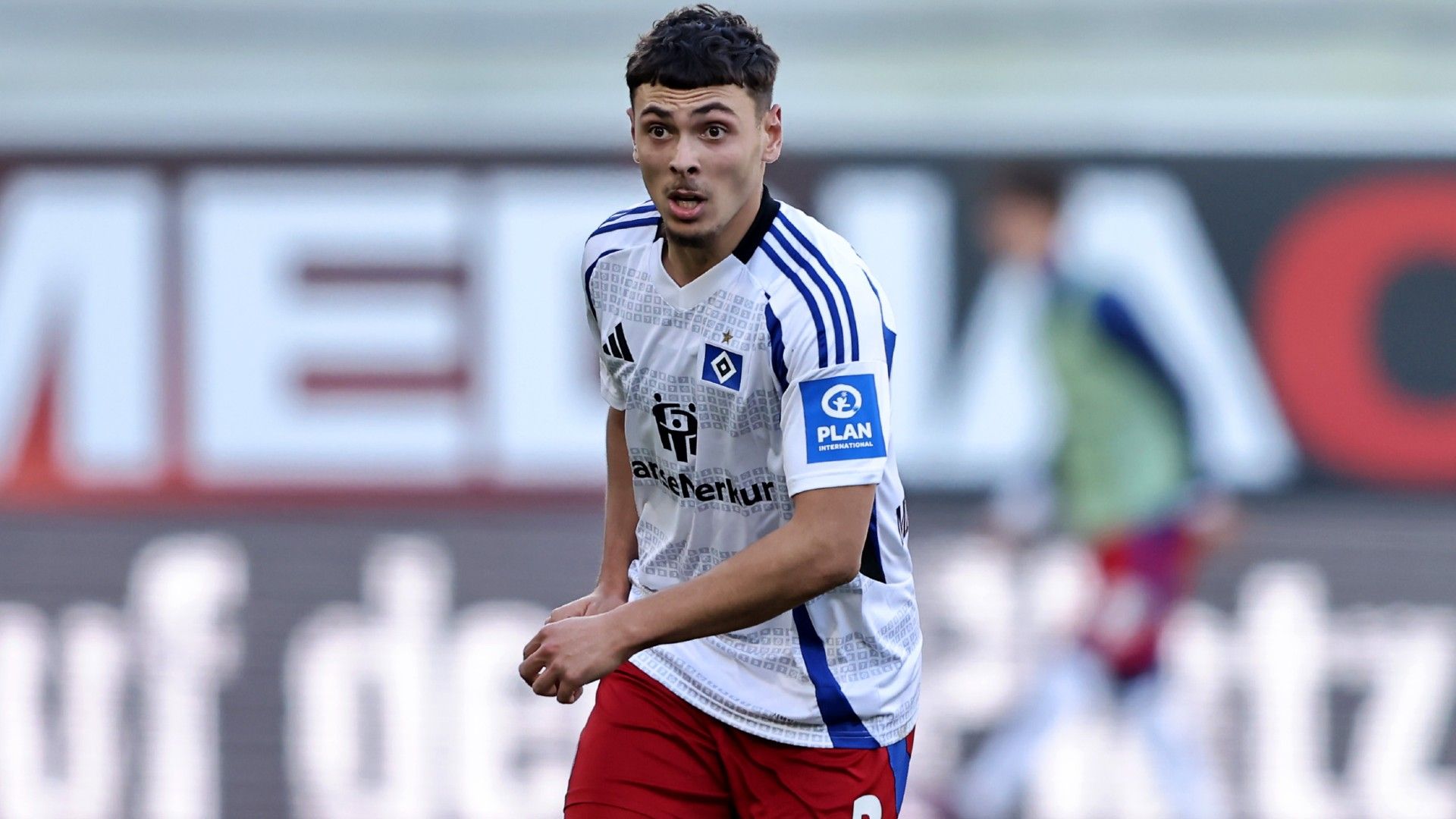 William Mickelbrencis of Hamburger SV runs with the ball