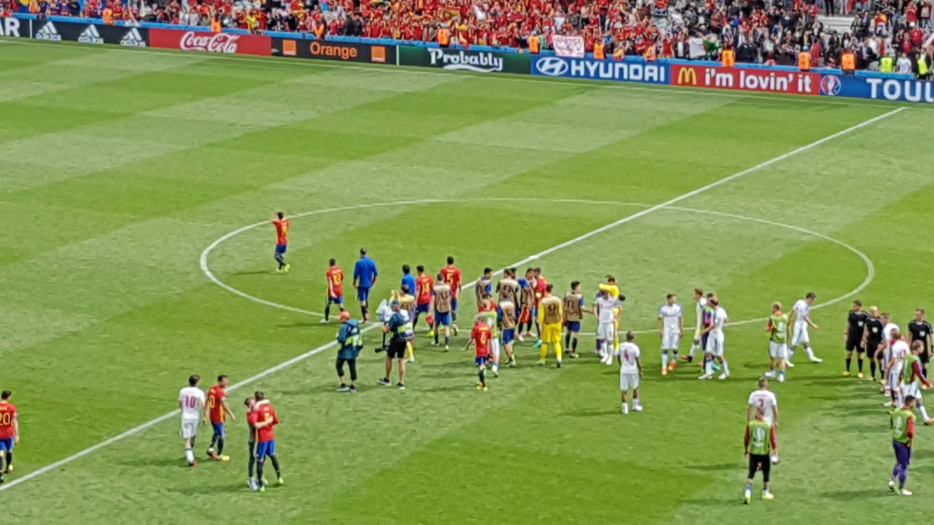 Spain fan at pitch with Pique