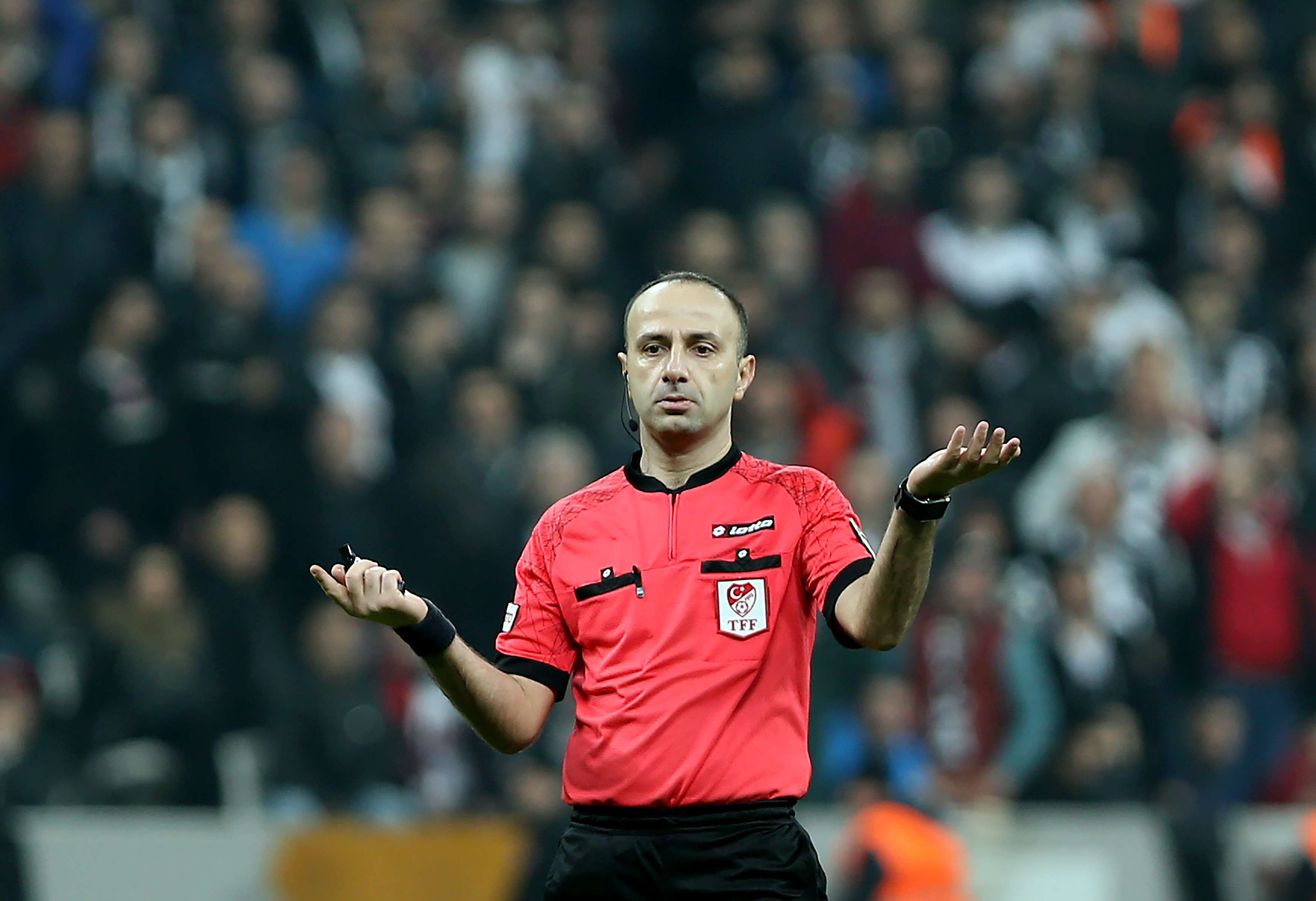 Turkish referee Baris Simsek