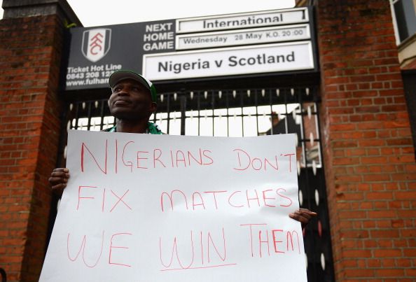 Nigeria fan with anti-match fixing placard