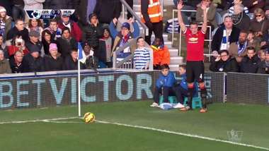 Phil Jones taking a corner kick for Manchester United