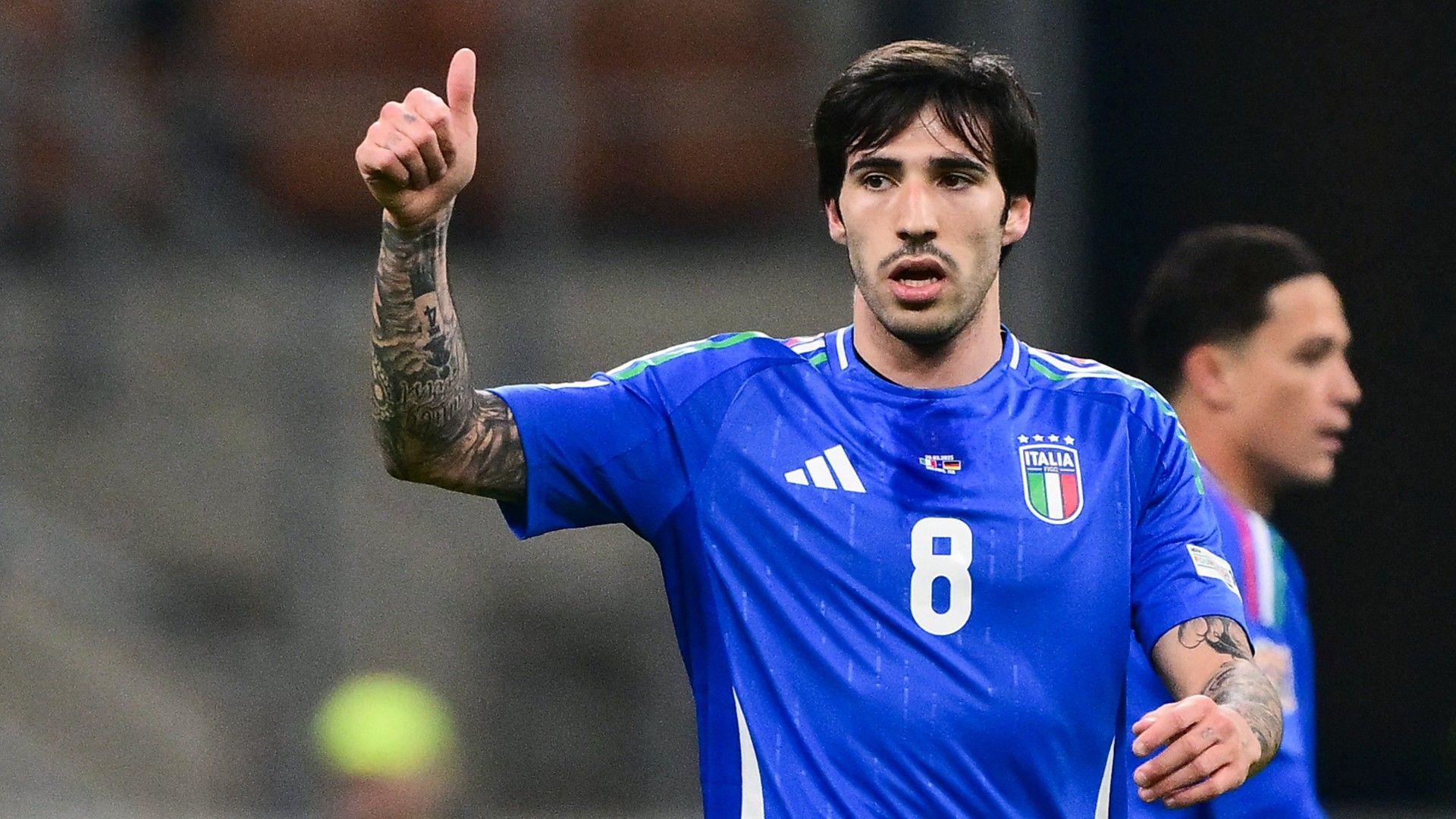  Italy's midfielder #08 Sandro Tonali celebrates after scoring his team's first goal