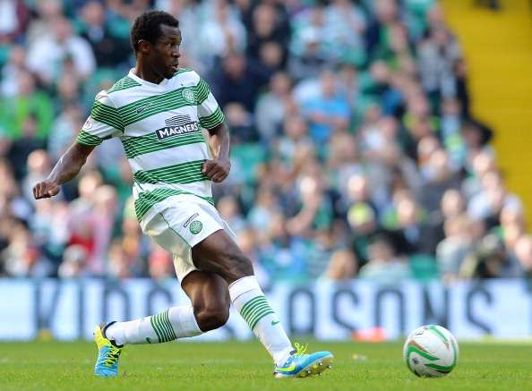 Efe Ambrose of Celtic in action during the Scottish Premier League game between Celtic and Ross County at Celtic Park Stadium on Aug 3, 2013