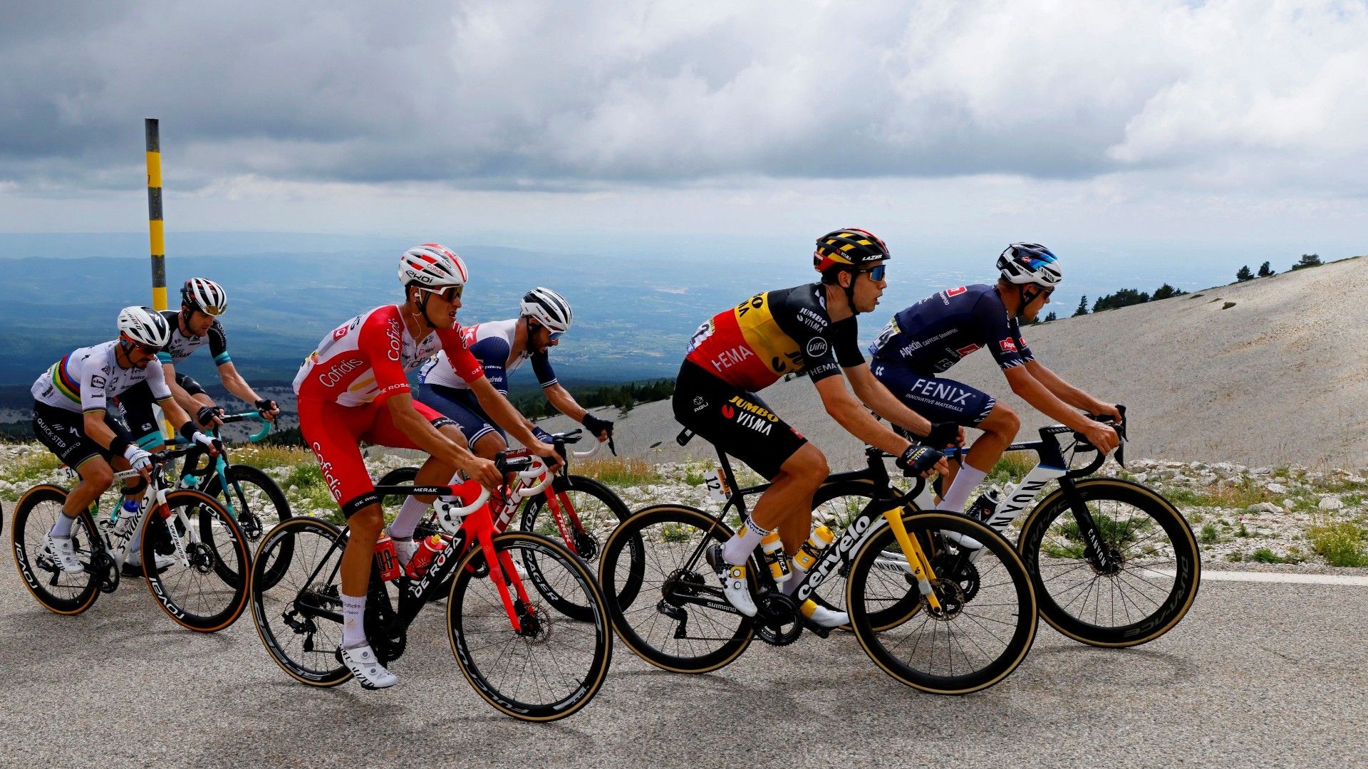 Breakaway riders climb the Mont Ventoux during the 11th stage of the 108th edition of the Tour de France