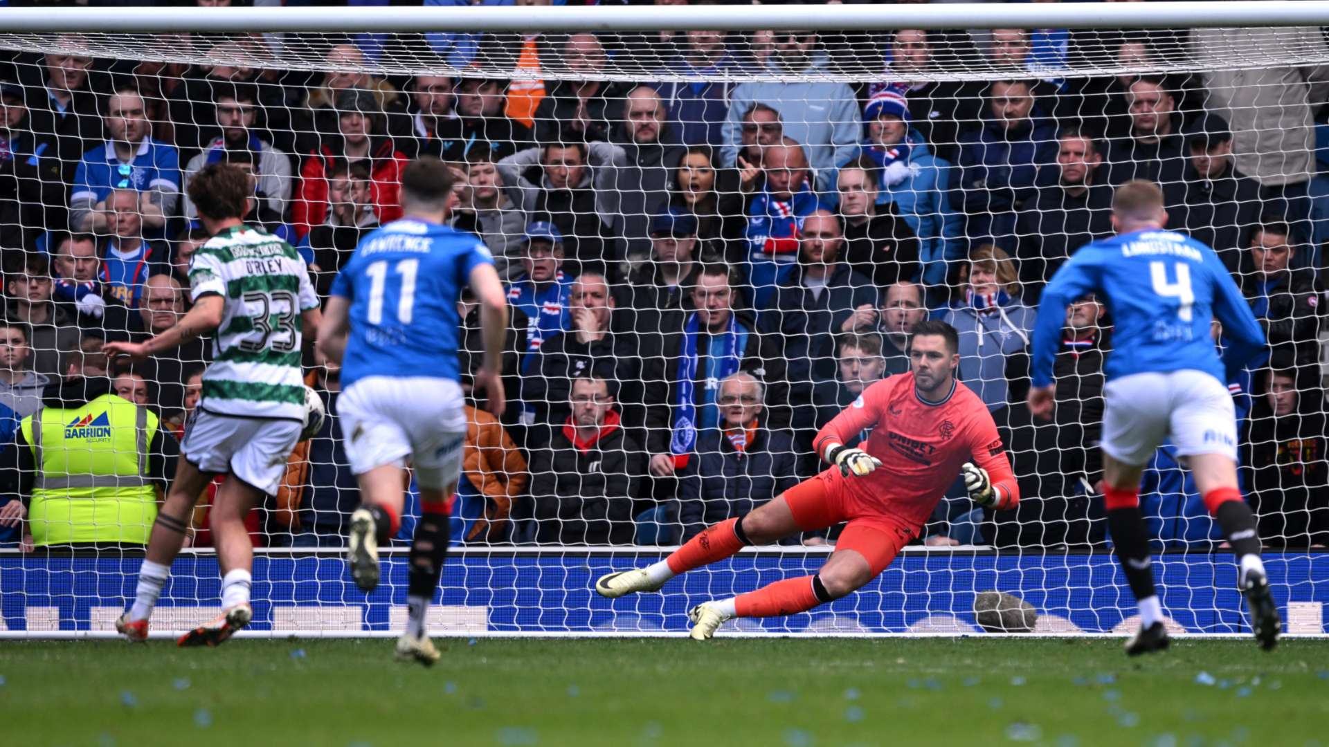 Celtic's Matt O'Riley scores penalty past Rangers' Jack Butland